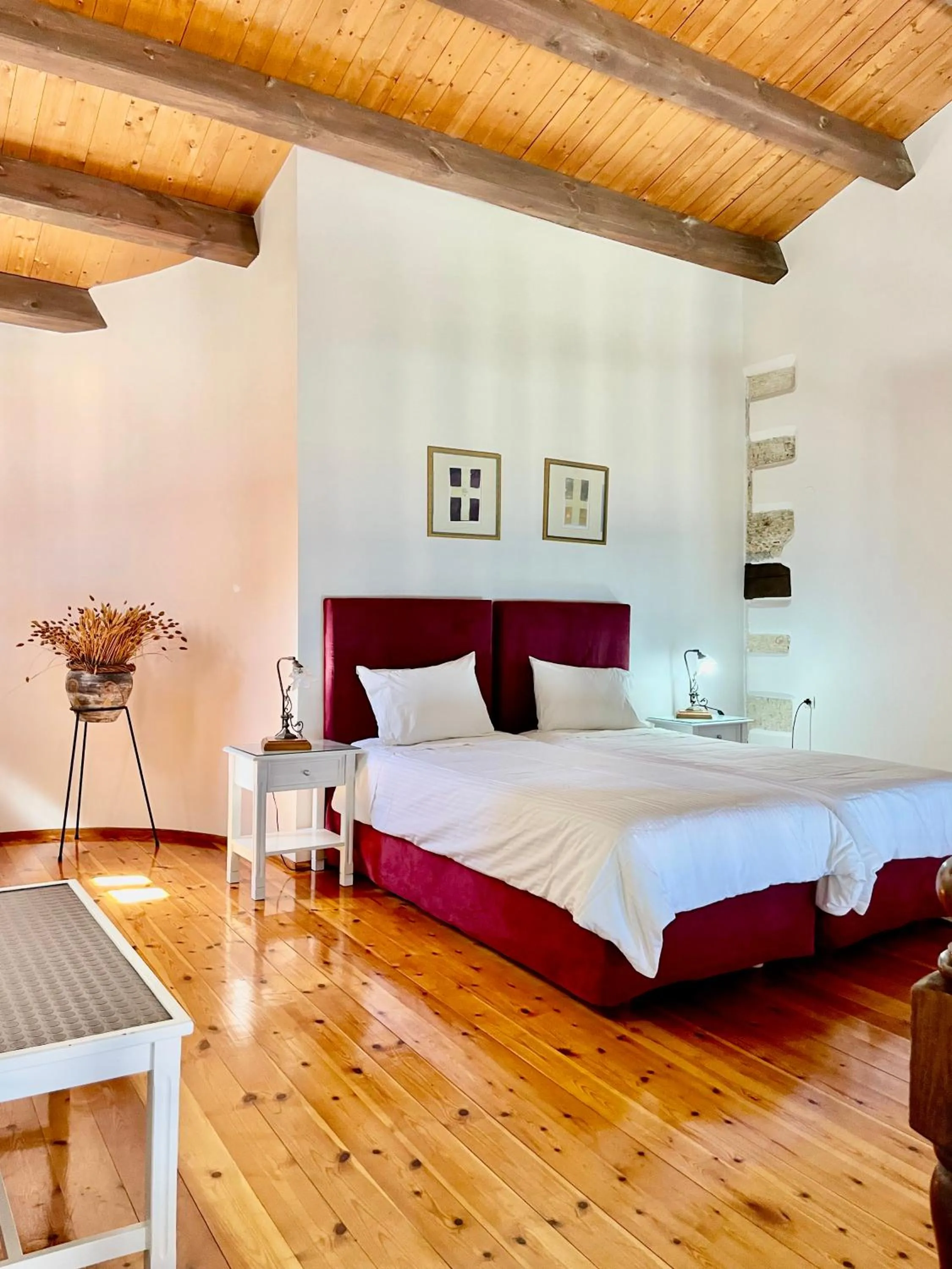 Bed in Erietta Suites