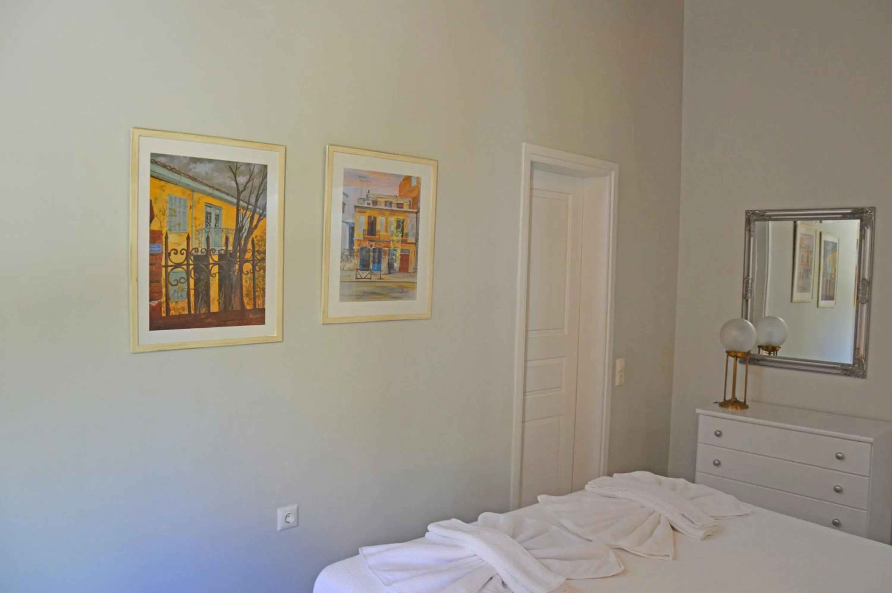 Bed in Erietta Suites