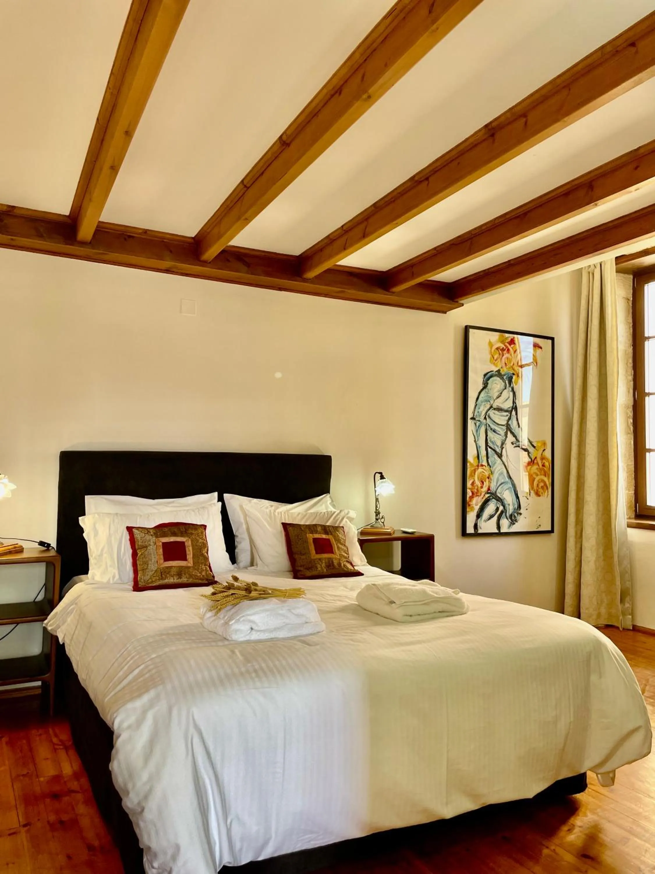 Bed in Erietta Suites