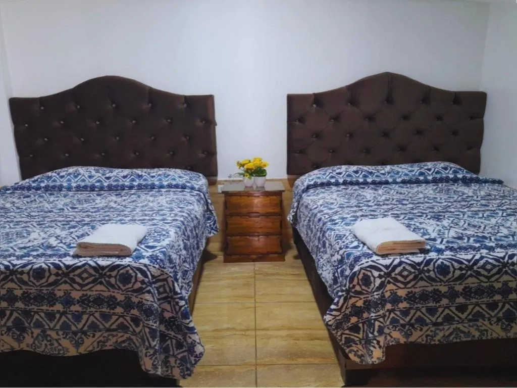 Bed in Hotel San Isidro