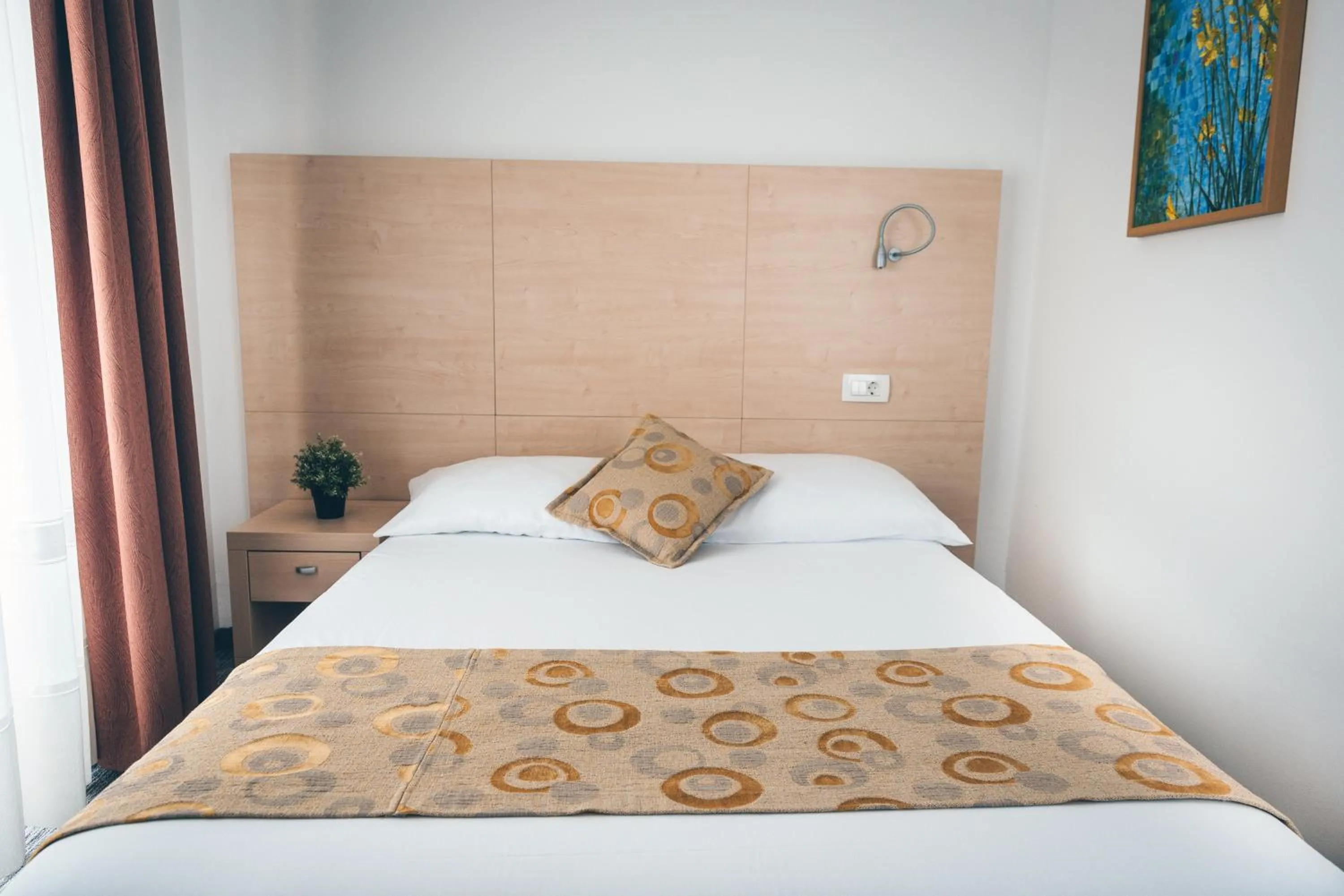 Bed in Hotel Delfin
