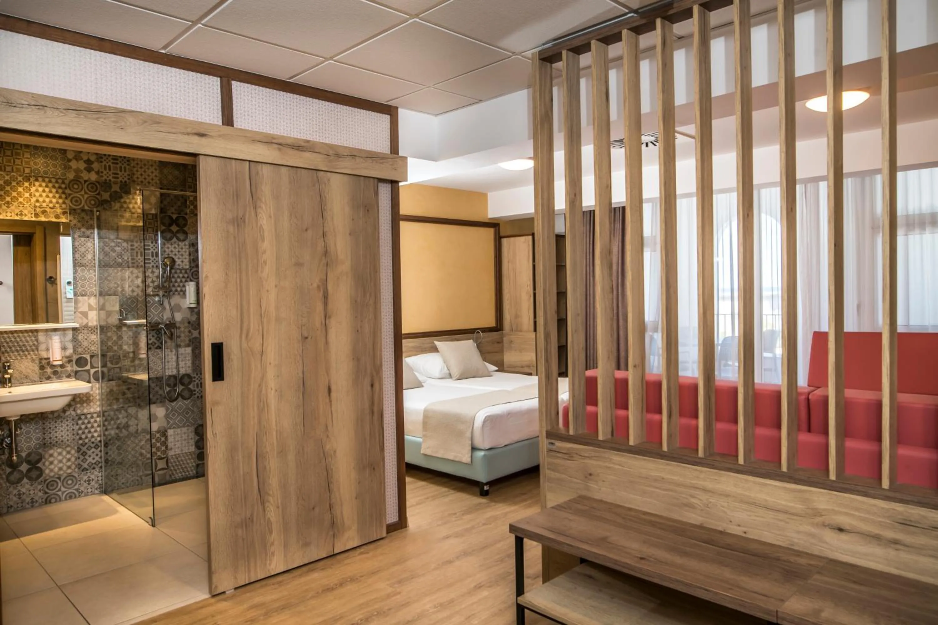 Bed in Hotel Delfin