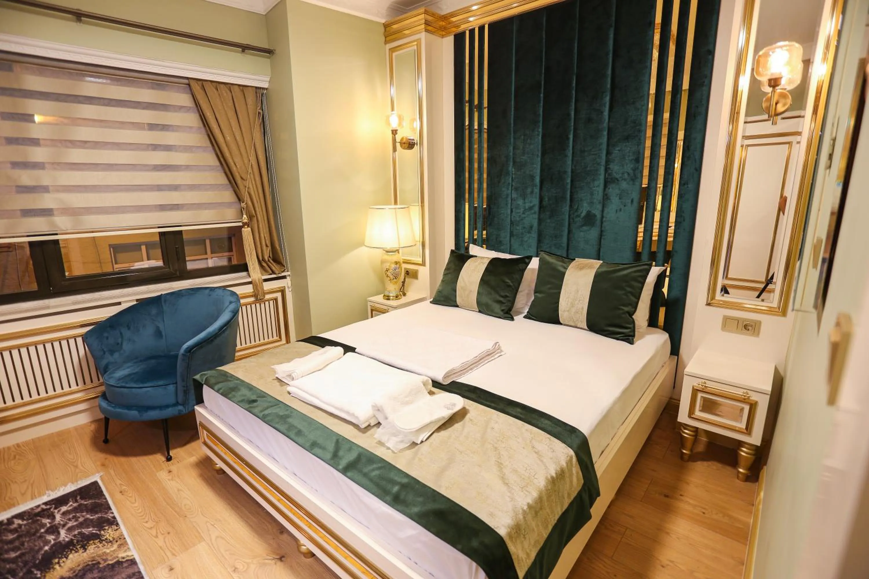 Bed in Whıte Moon Hotel Suites
