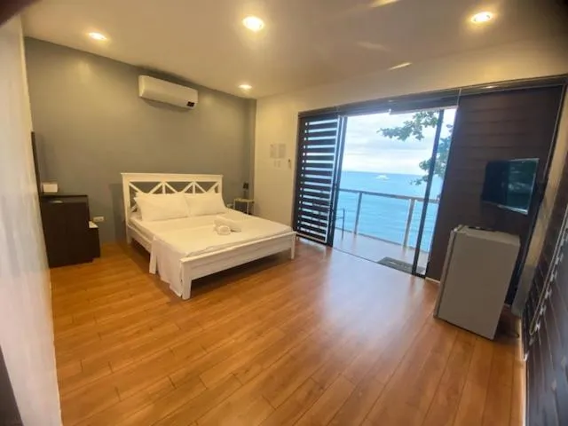 Bed in Baki Divers and Beach Resort
