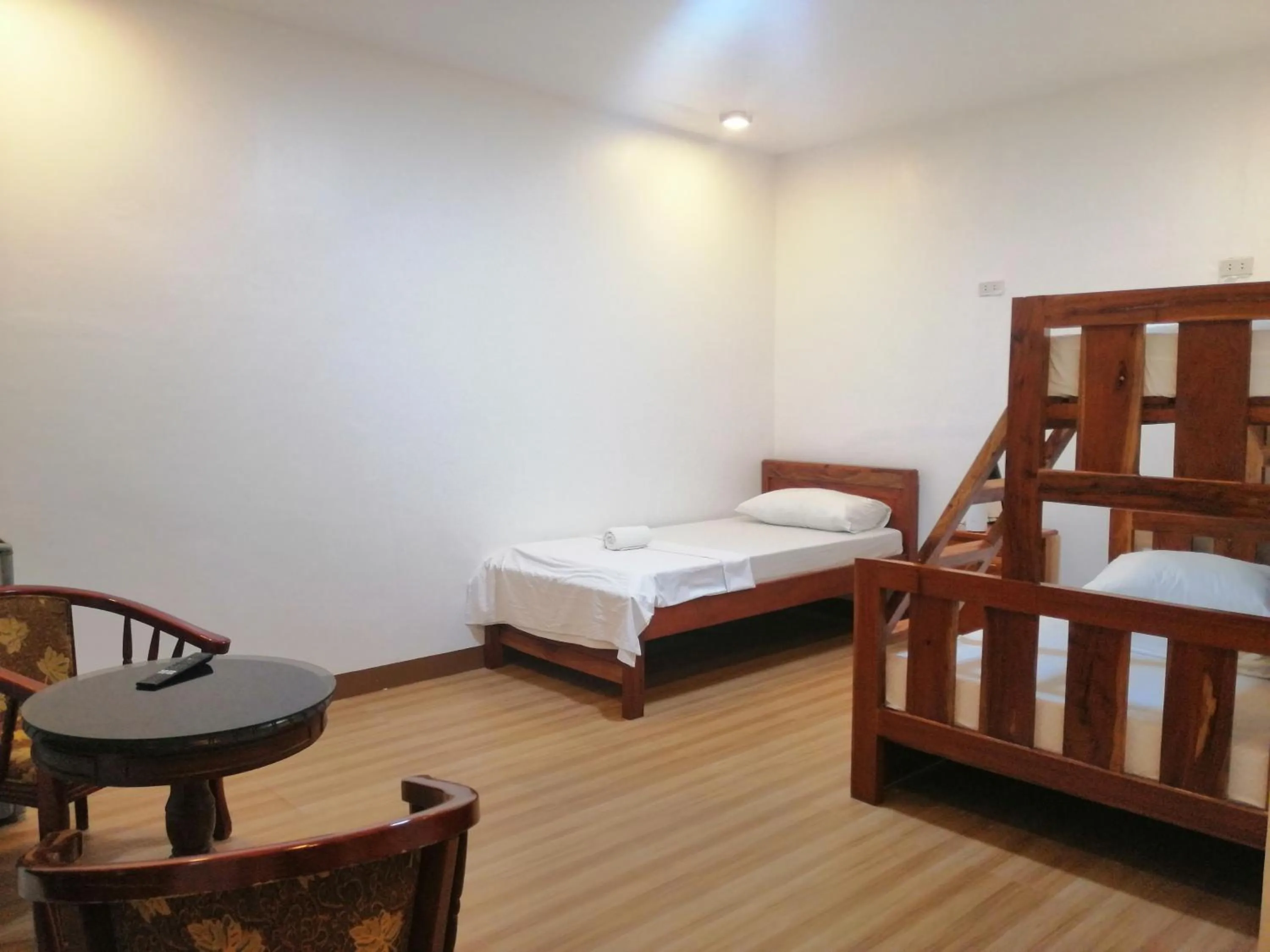 Bed in Baki Divers and Beach Resort