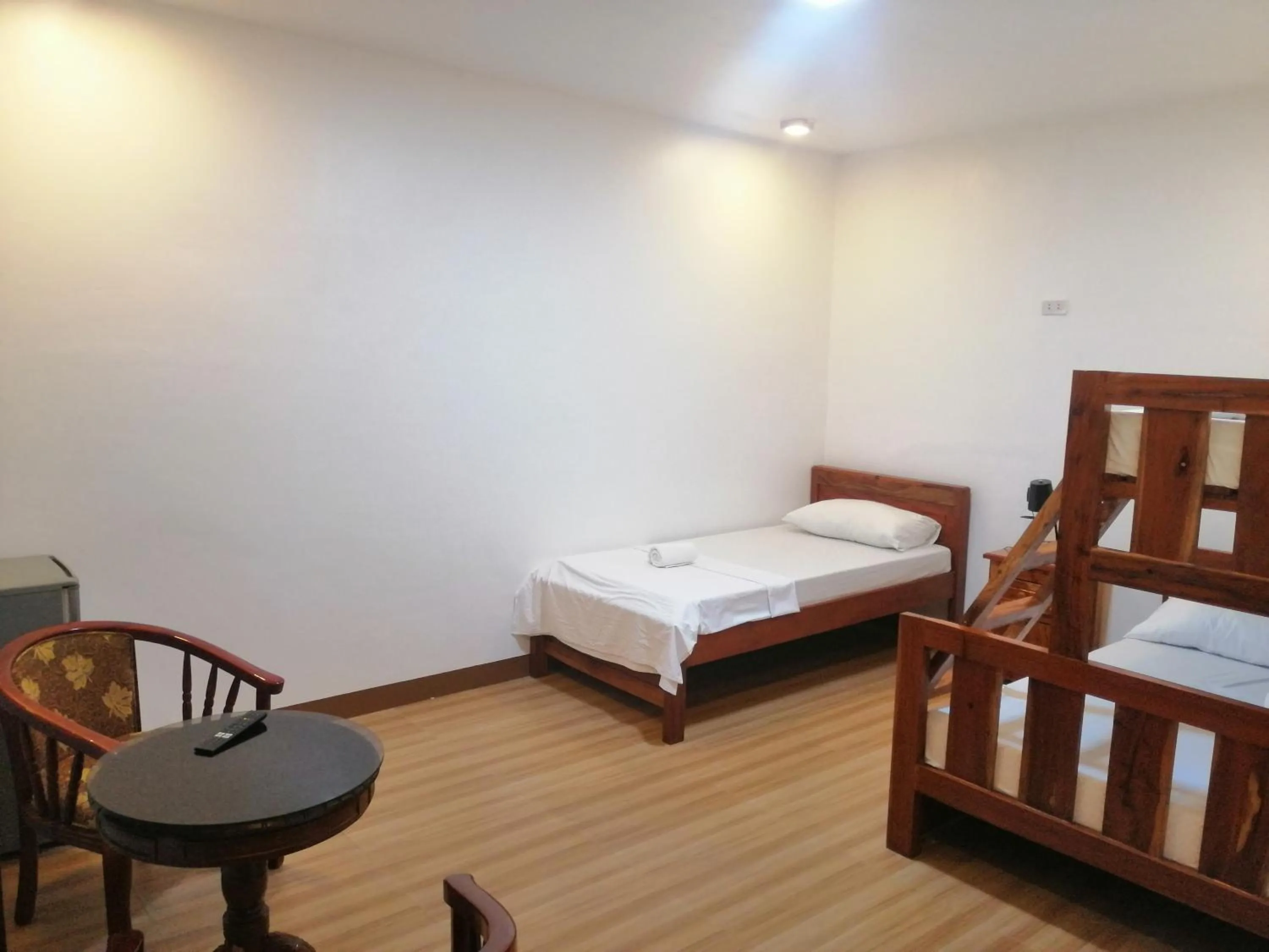 Bed in Baki Divers and Beach Resort