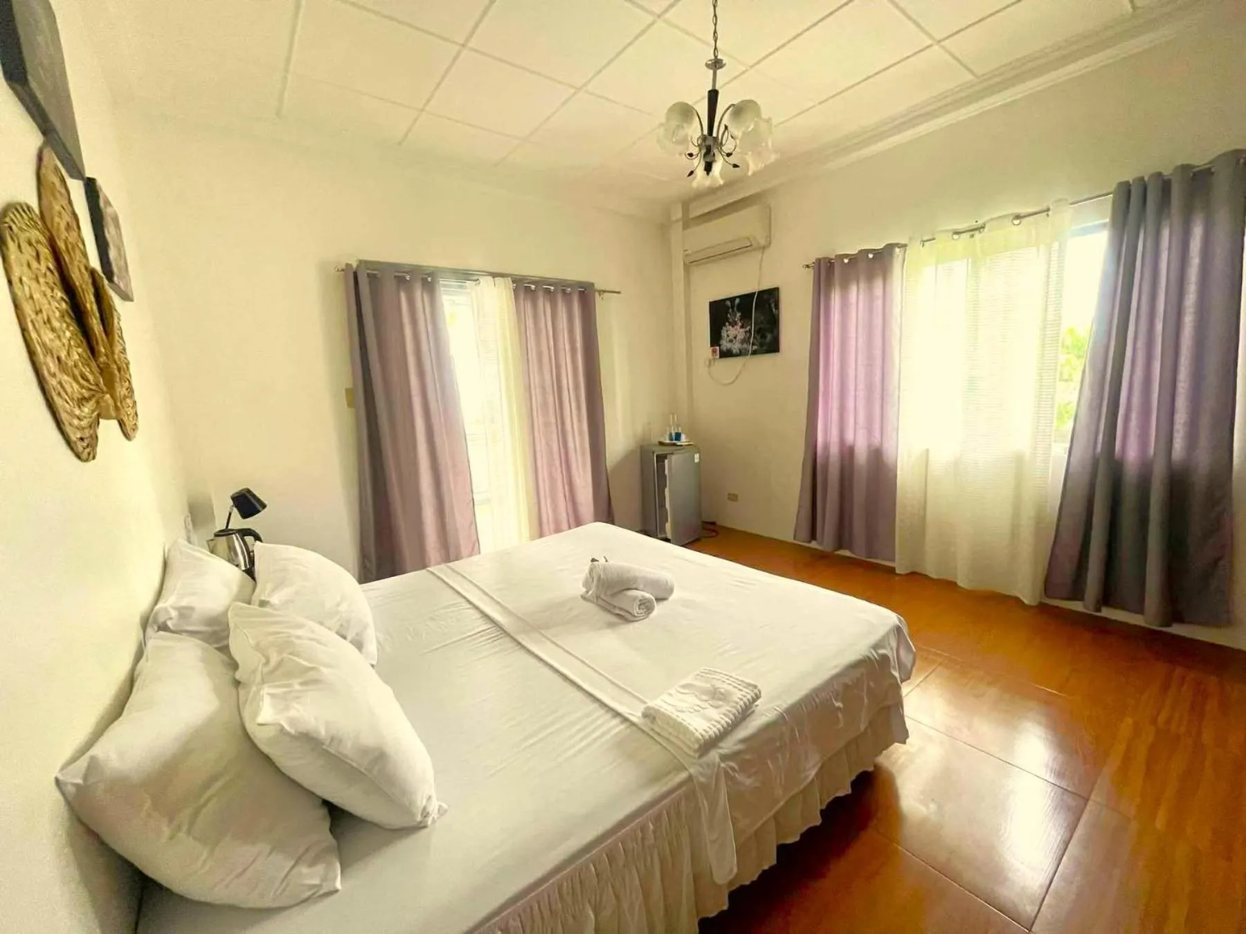 Bed in Baki Divers and Beach Resort