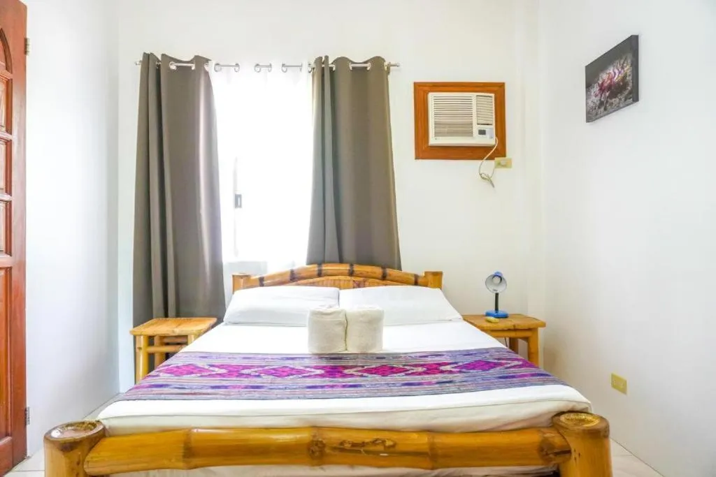 Bed in Baki Divers and Beach Resort