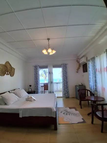 Bed in Baki Divers and Beach Resort