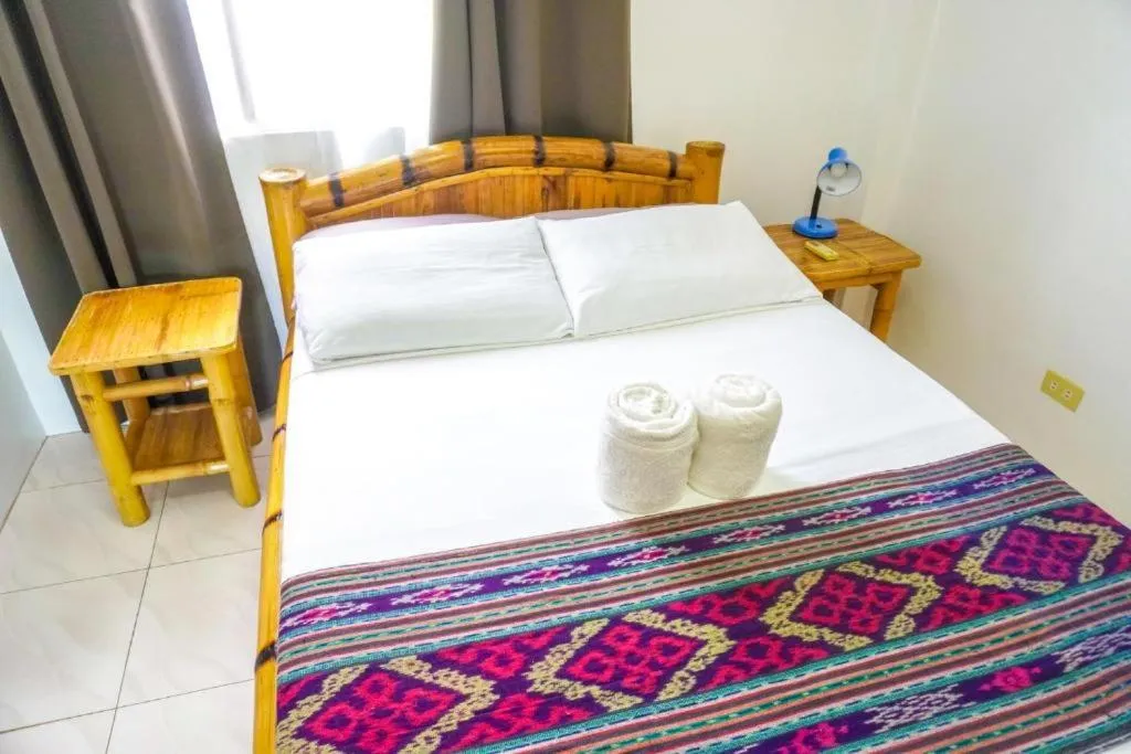 Bed in Baki Divers and Beach Resort