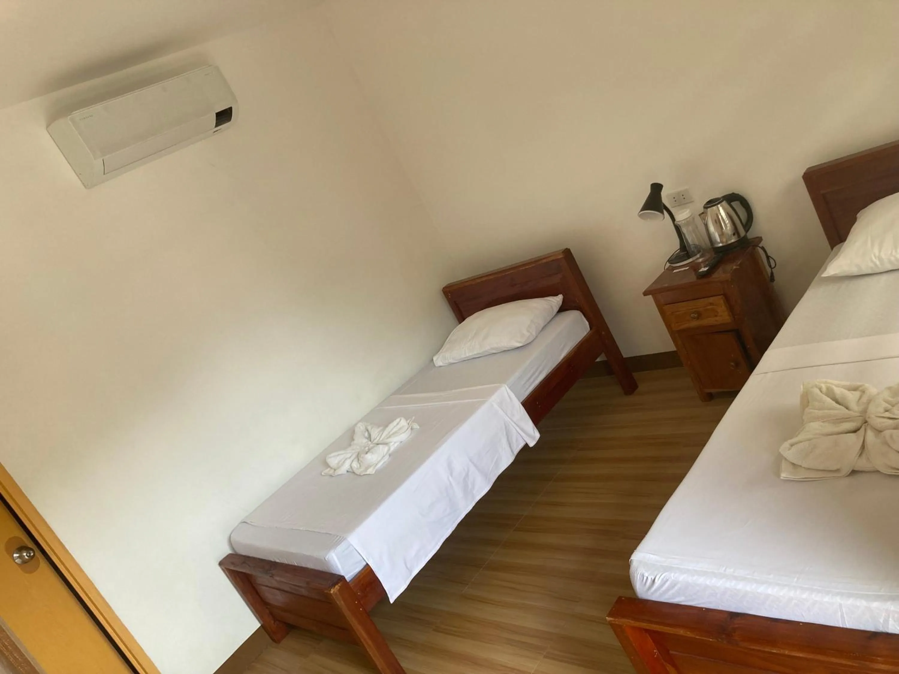 Bed in Baki Divers and Beach Resort