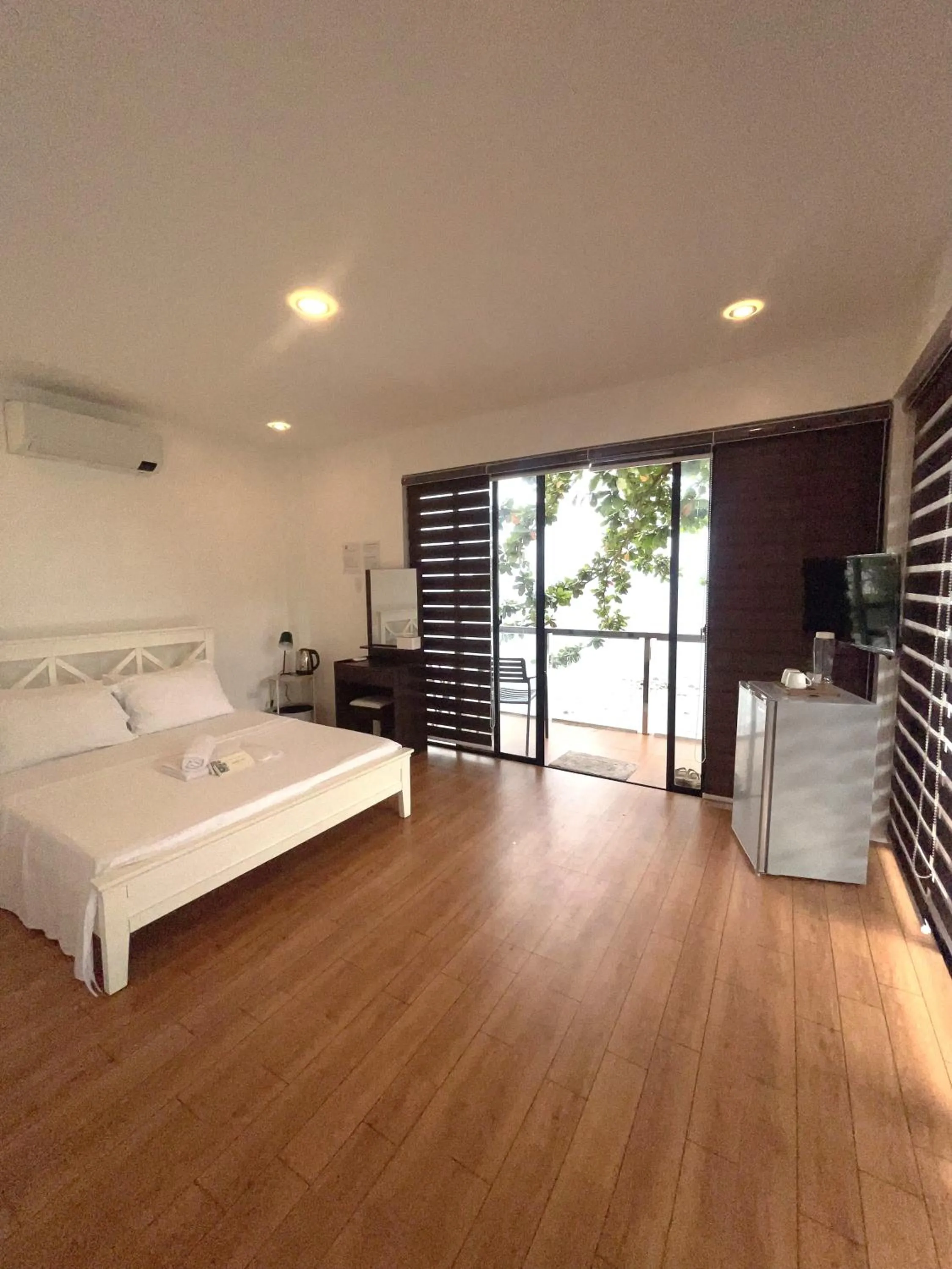 Bed in Baki Divers and Beach Resort