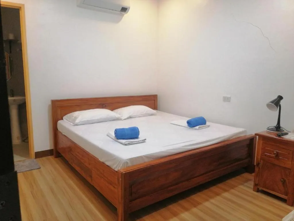 Bed in Baki Divers and Beach Resort