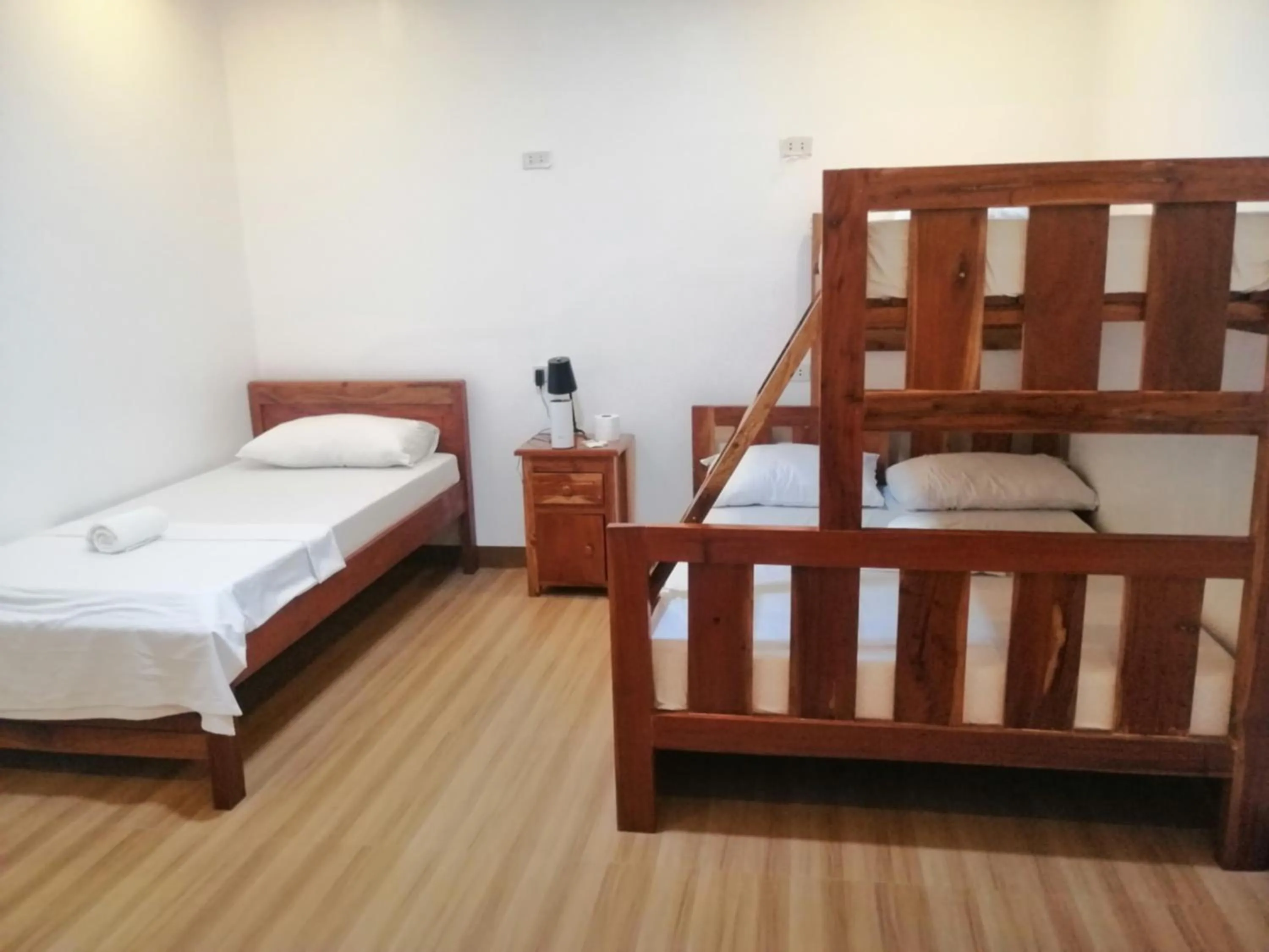 Bed in Baki Divers and Beach Resort