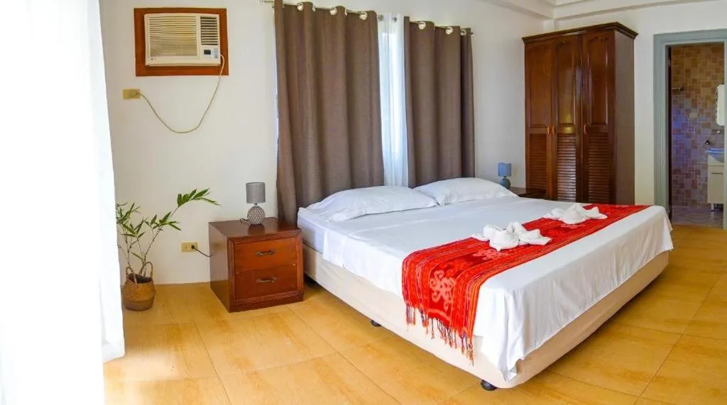 Bed in Baki Divers and Beach Resort