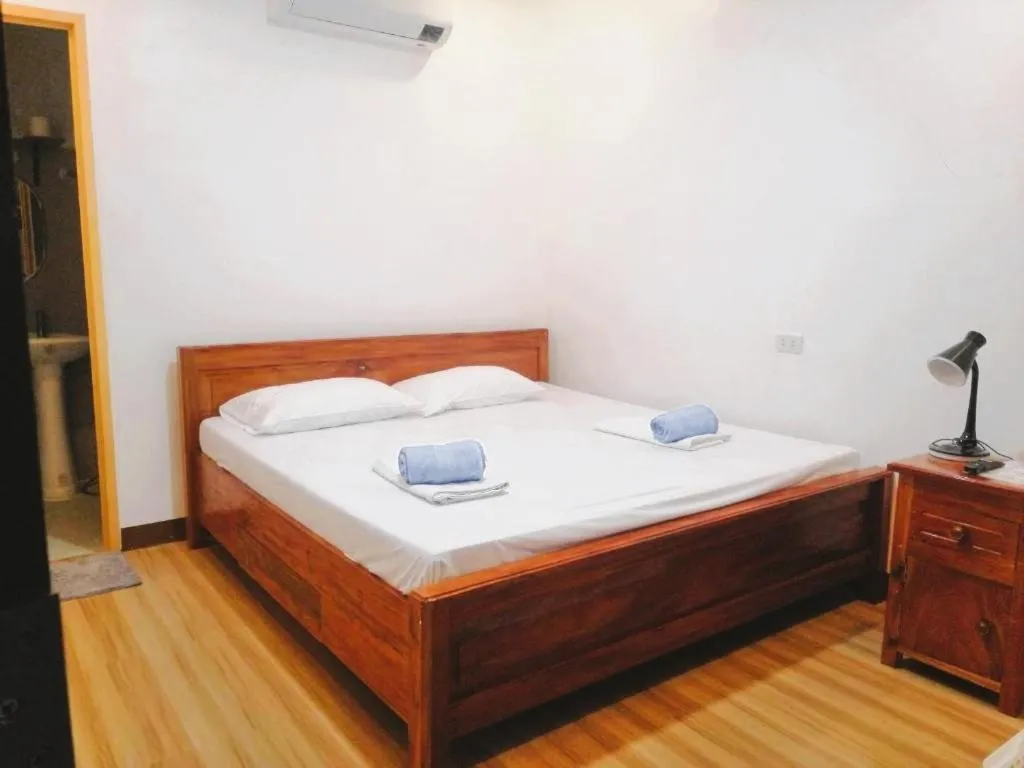 Bed in Baki Divers and Beach Resort
