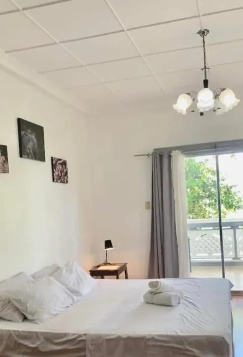 Bed in Baki Divers and Beach Resort