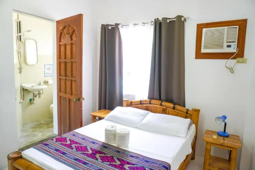 Shower, Bed in Baki Divers and Beach Resort