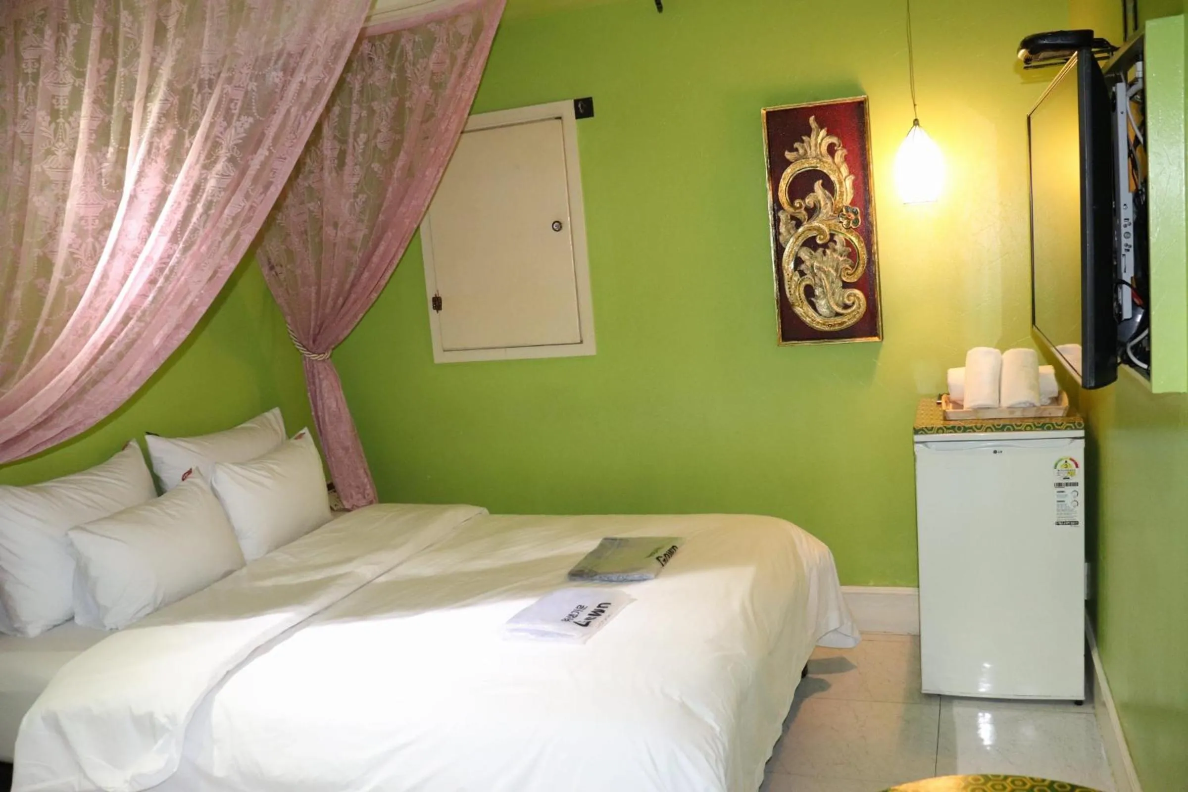 Bed in Hotel Marigold