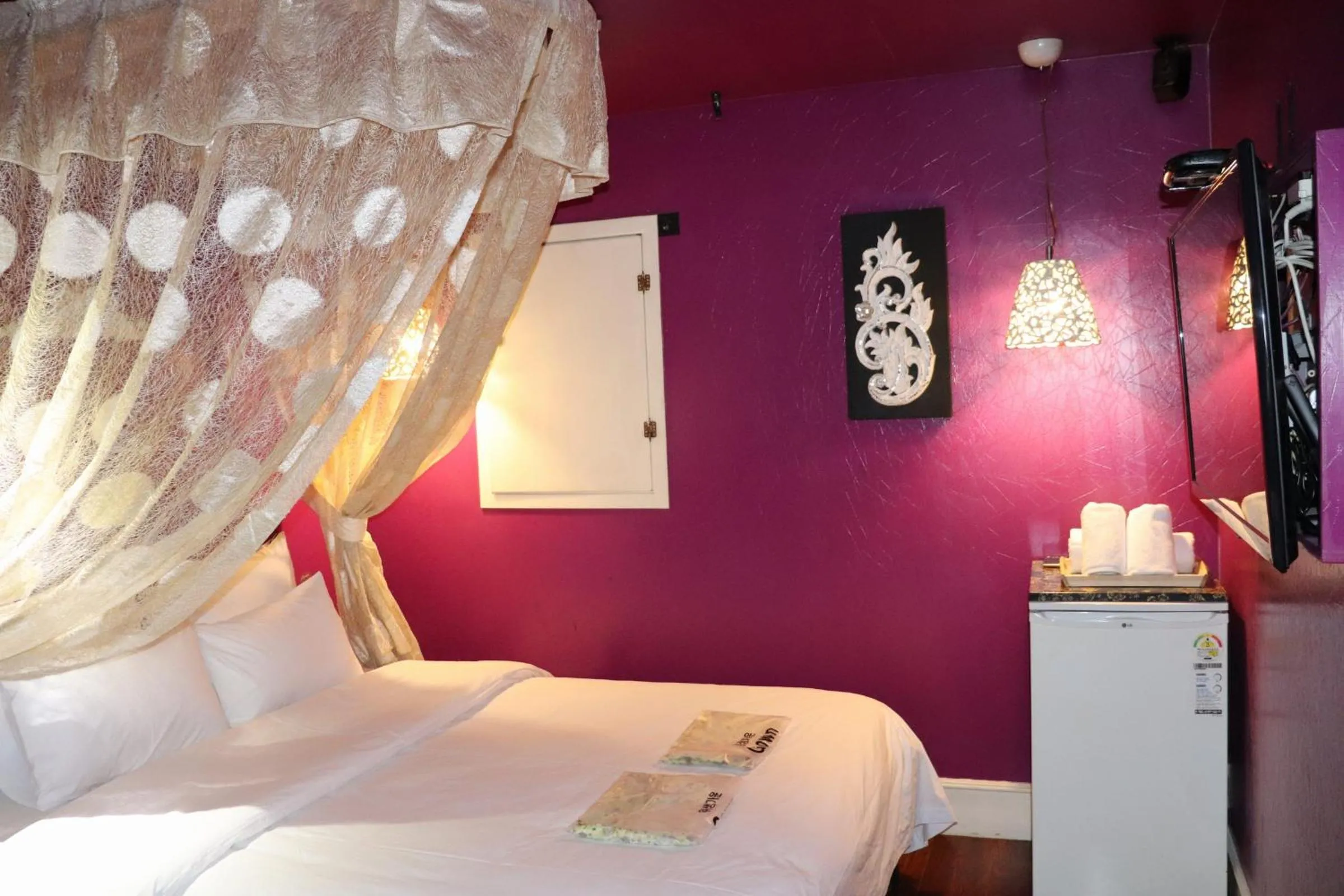 Bed in Hotel Marigold
