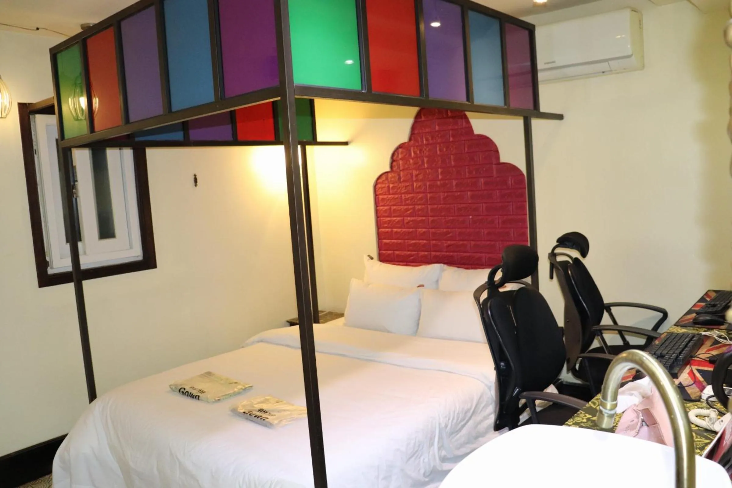 Bed in Hotel Marigold