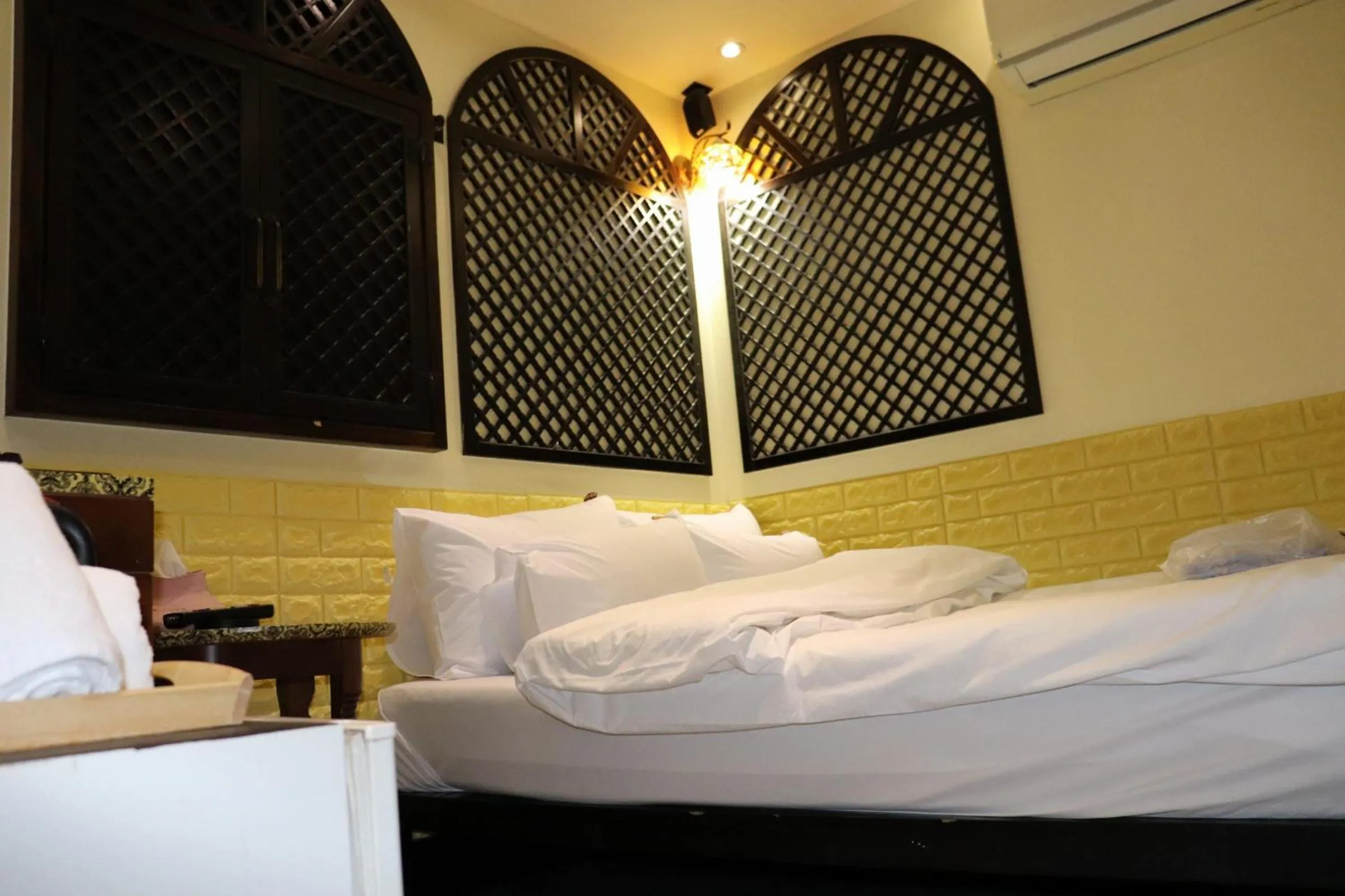 Bed in Hotel Marigold