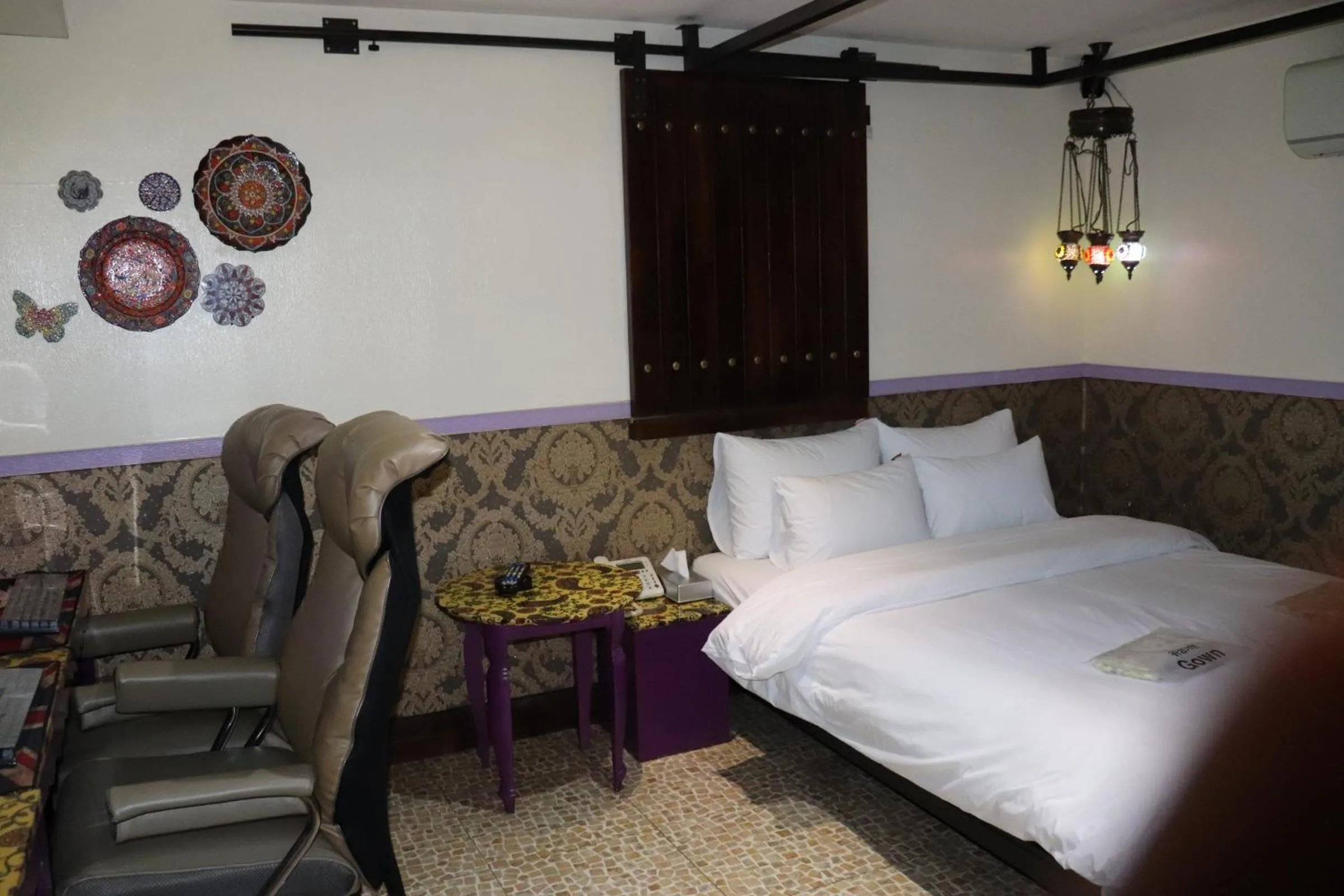 Bed in Hotel Marigold