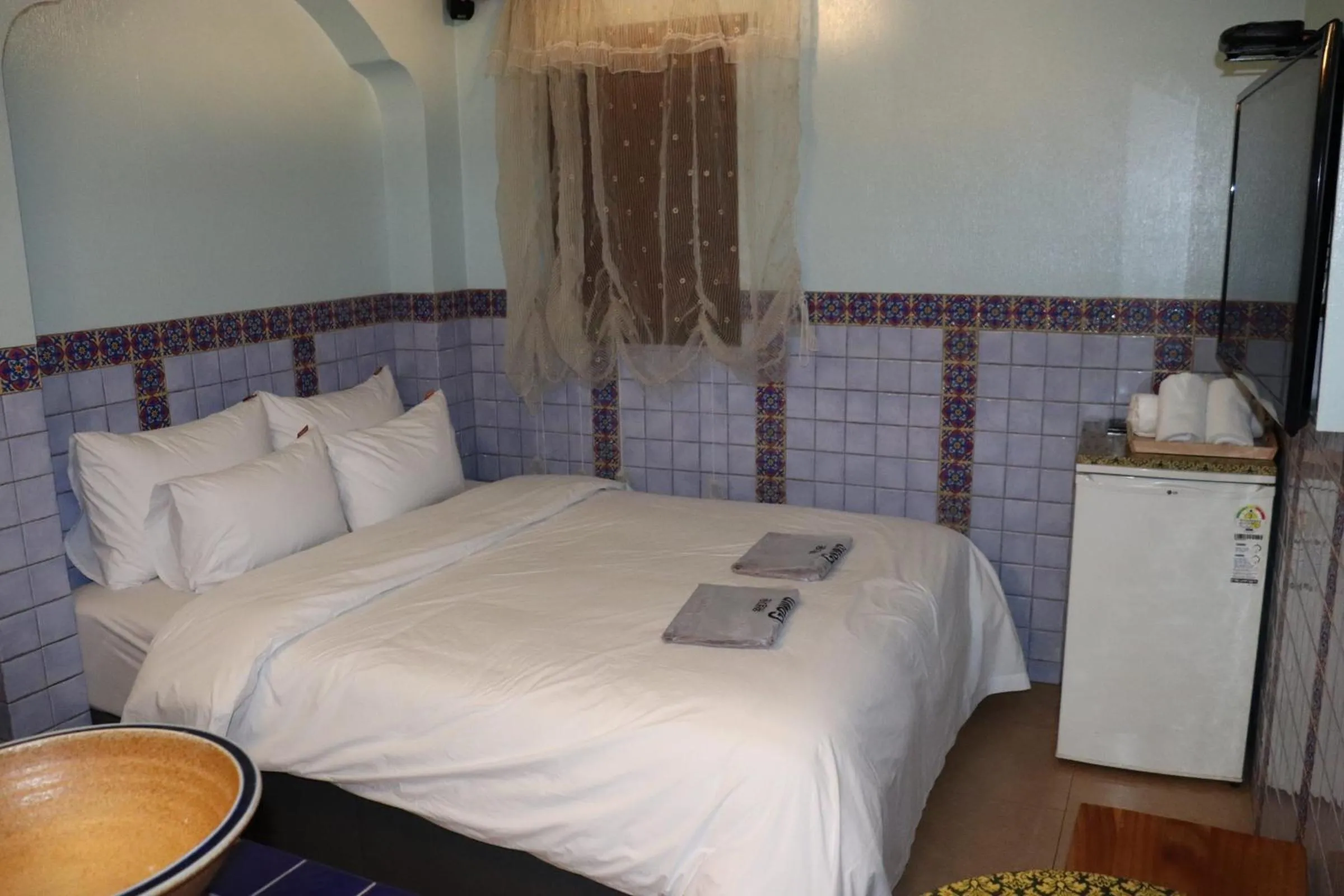 Bed in Hotel Marigold
