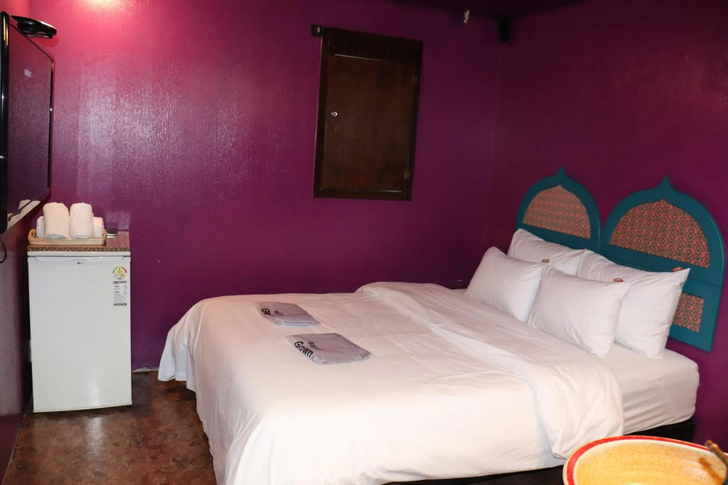 Bed in Hotel Marigold