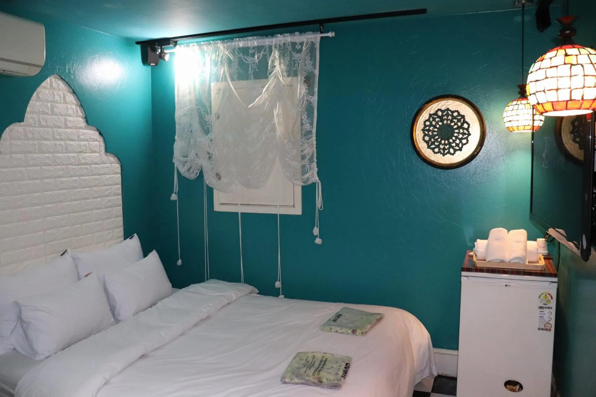 Bed in Hotel Marigold