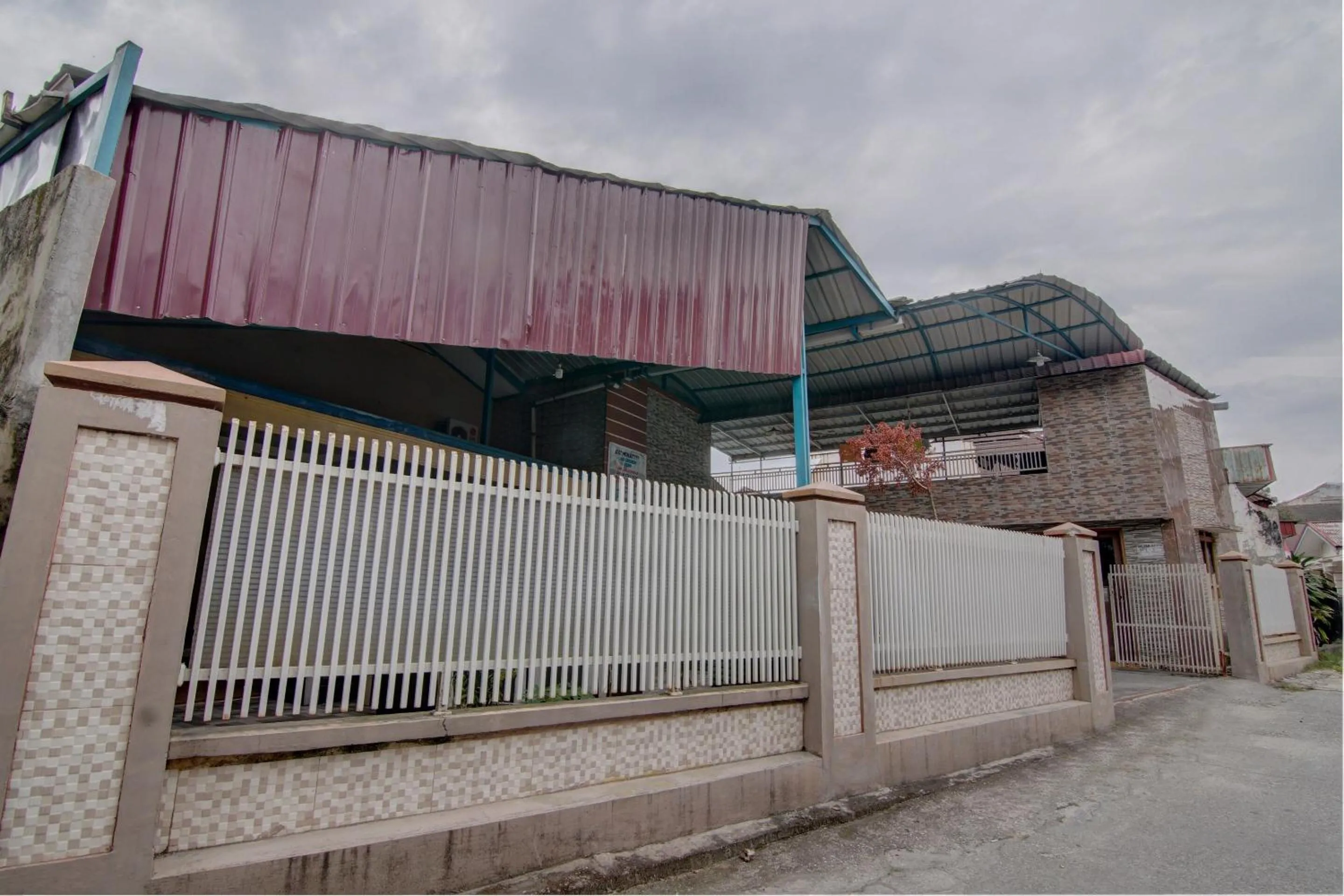 Facade/entrance in OYO 92833 Penginapan Syariah