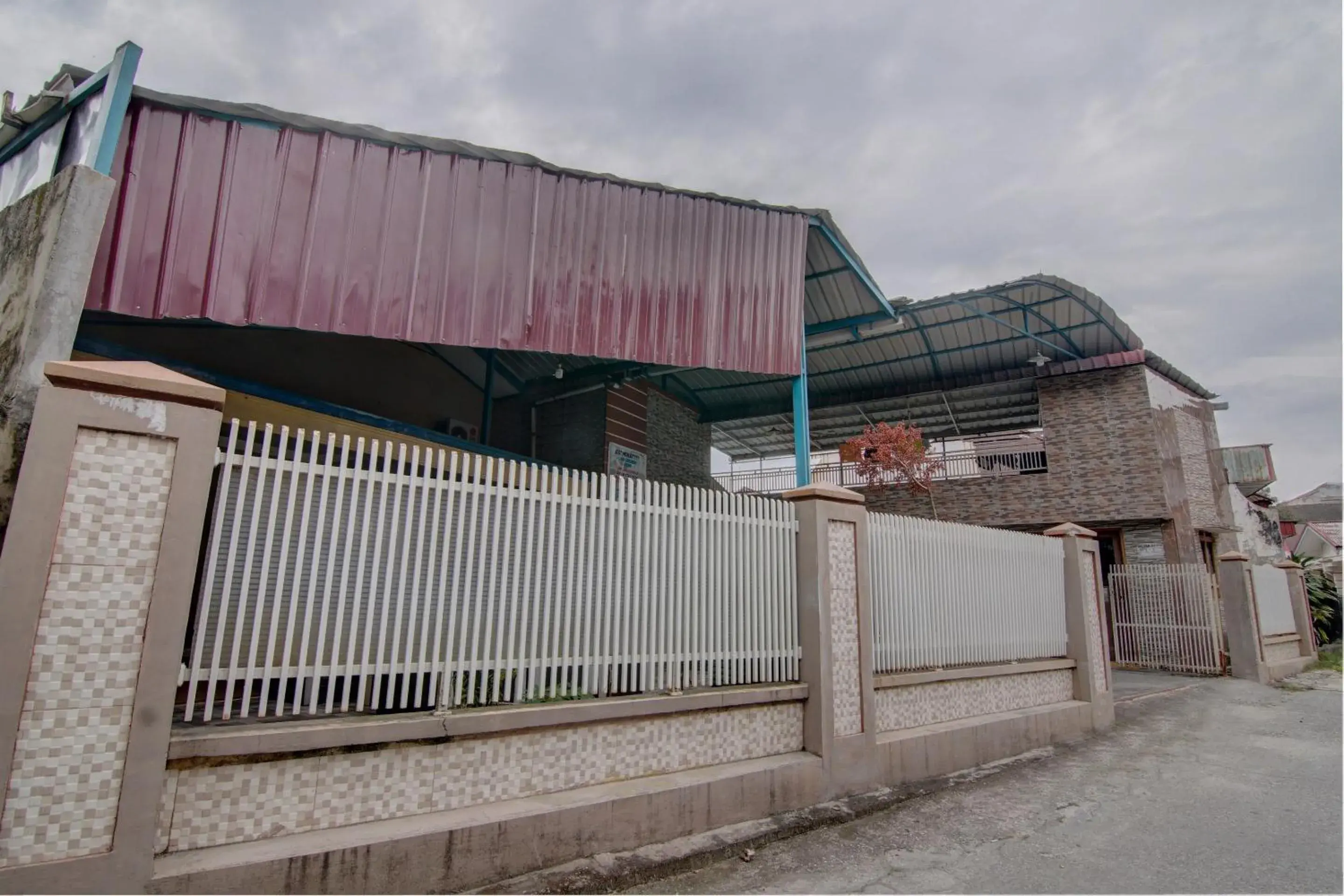 Facade/entrance in OYO 92833 Penginapan Syariah Facade/entrance in OYO 92833 Penginapan Syariah