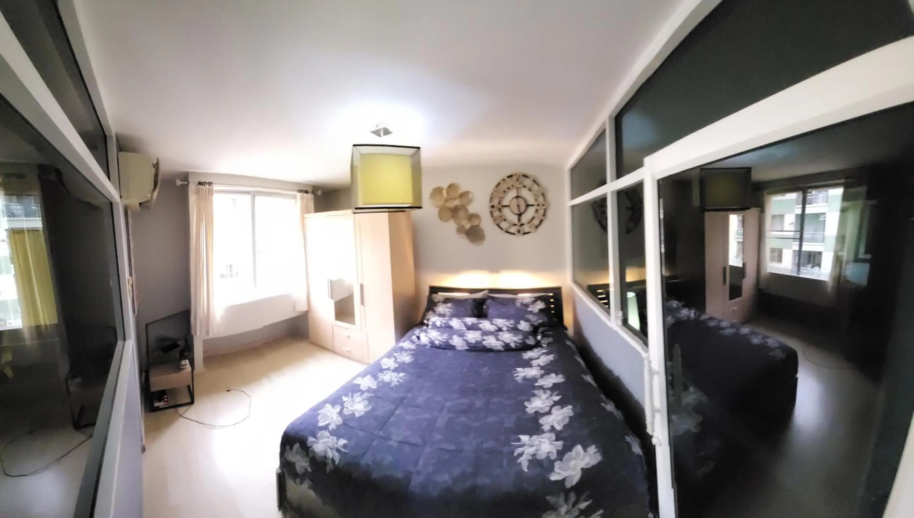 Bed in The Parkland Condominium