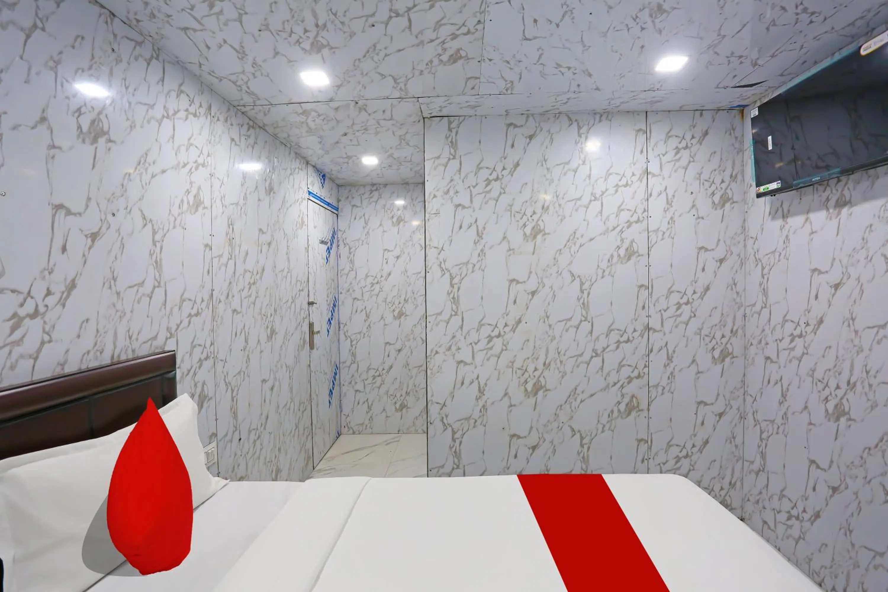 Bedroom in Hotel O Happy Hours