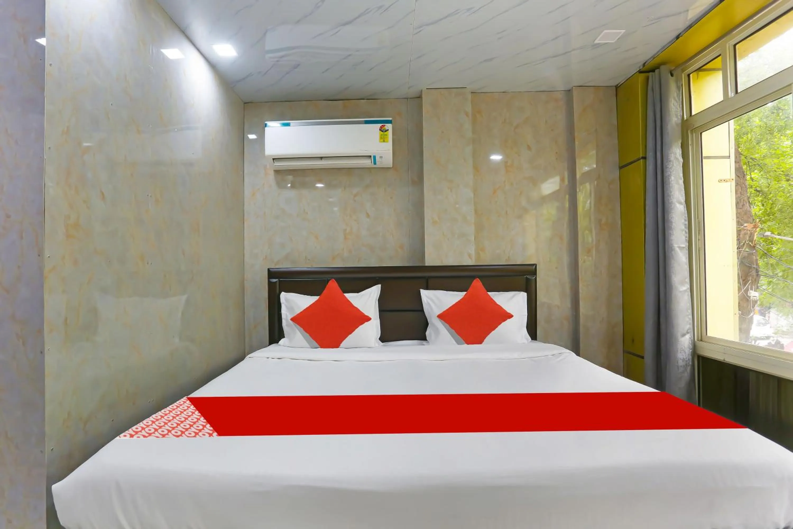 Bedroom in Hotel O Happy Hours