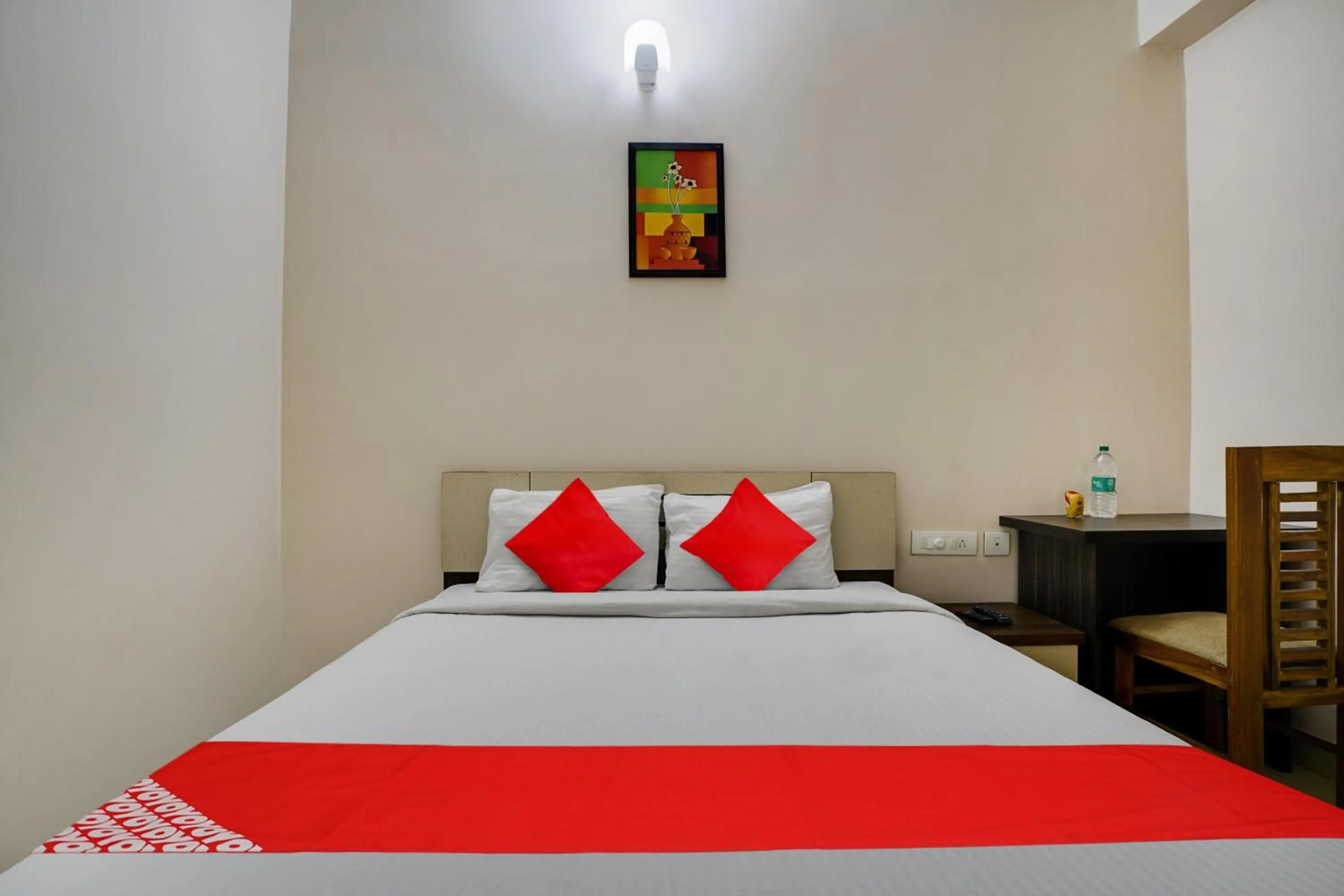 Bedroom in OYO Flagship Arrows Tourist Home