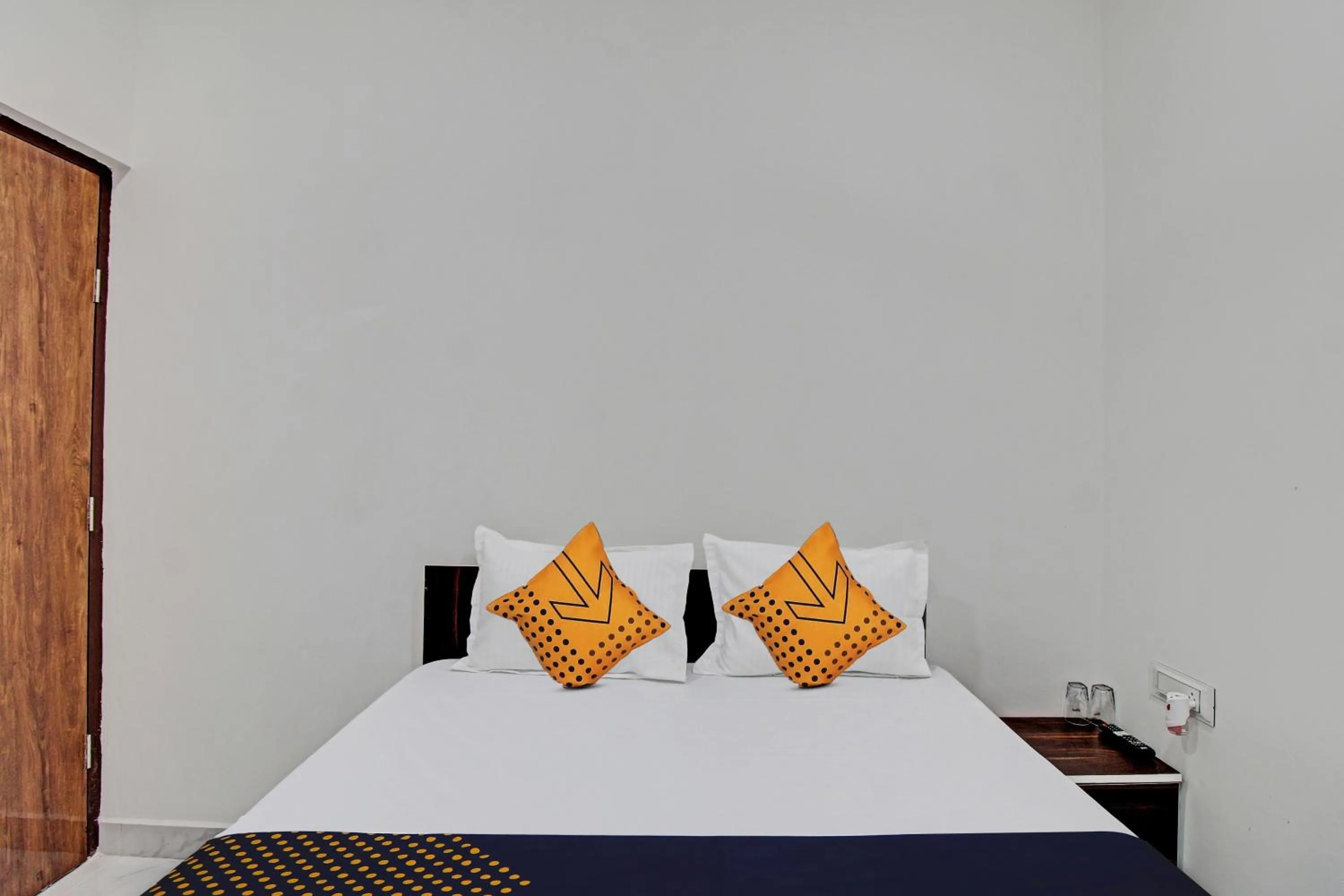 Bedroom, Bed in Spot On Tulsi Stay Inn