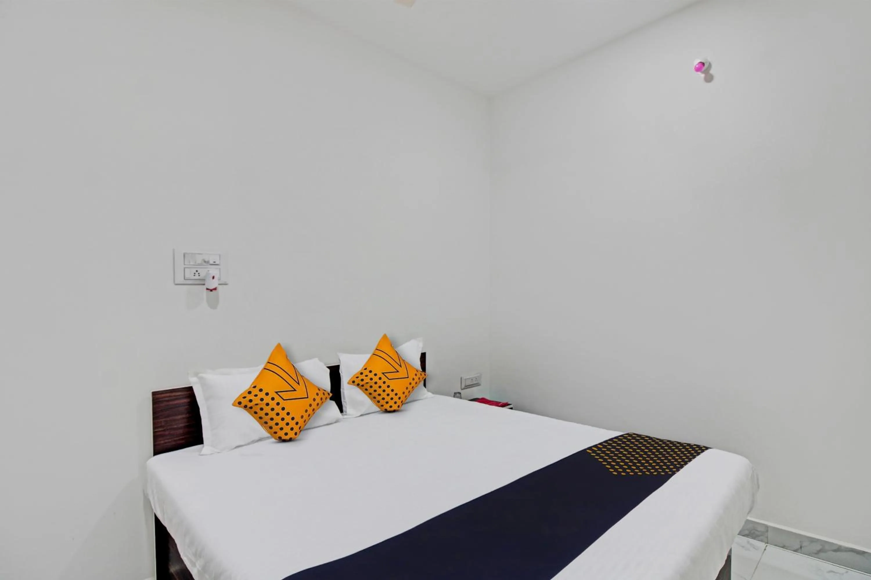 Bedroom, Bed in Spot On Tulsi Stay Inn