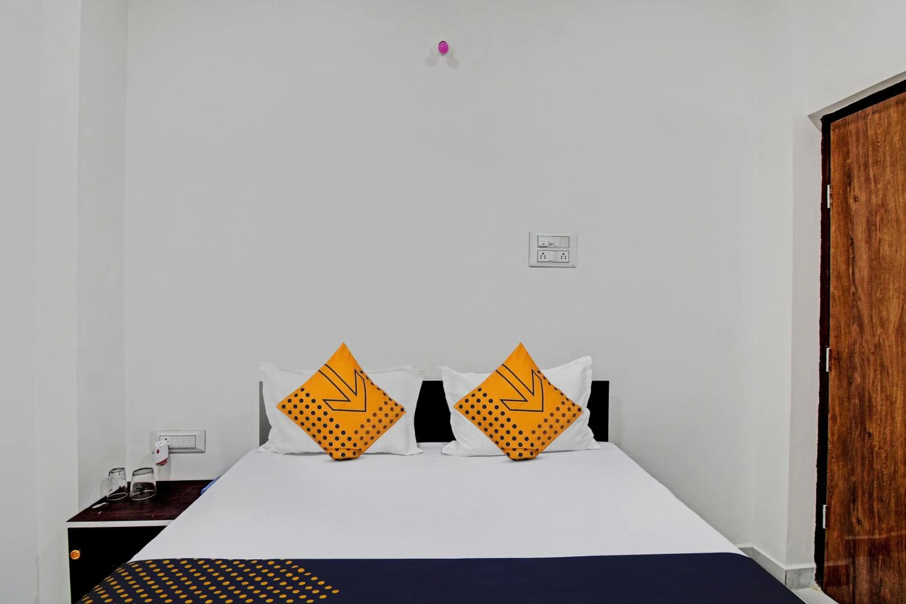 Bedroom in Spot On Tulsi Stay Inn