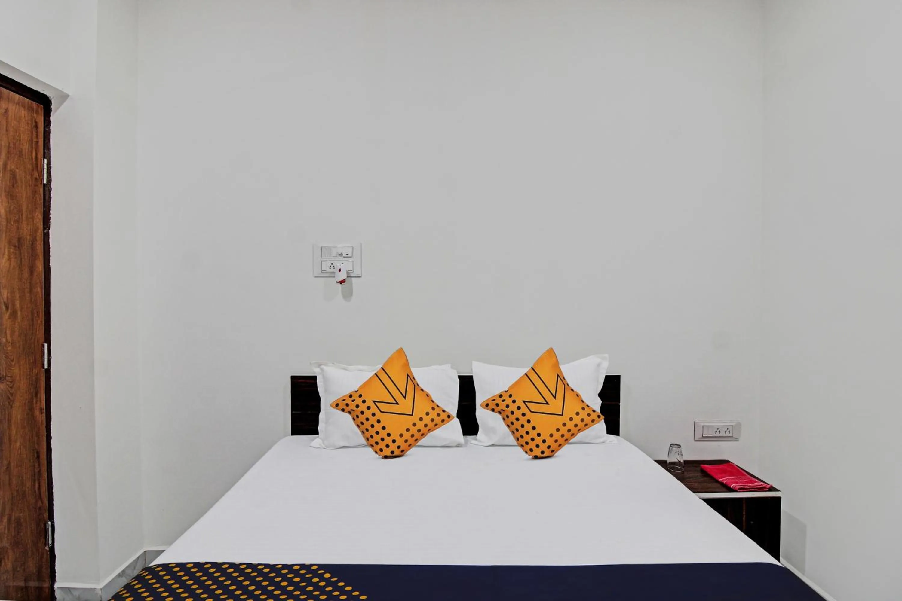 Bedroom, Bed in Spot On Tulsi Stay Inn