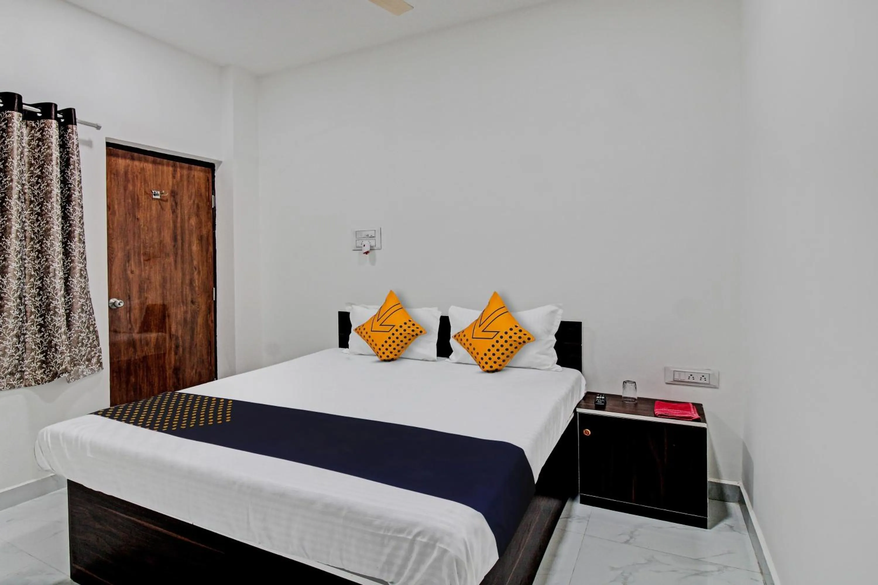 Bedroom in Spot On Tulsi Stay Inn