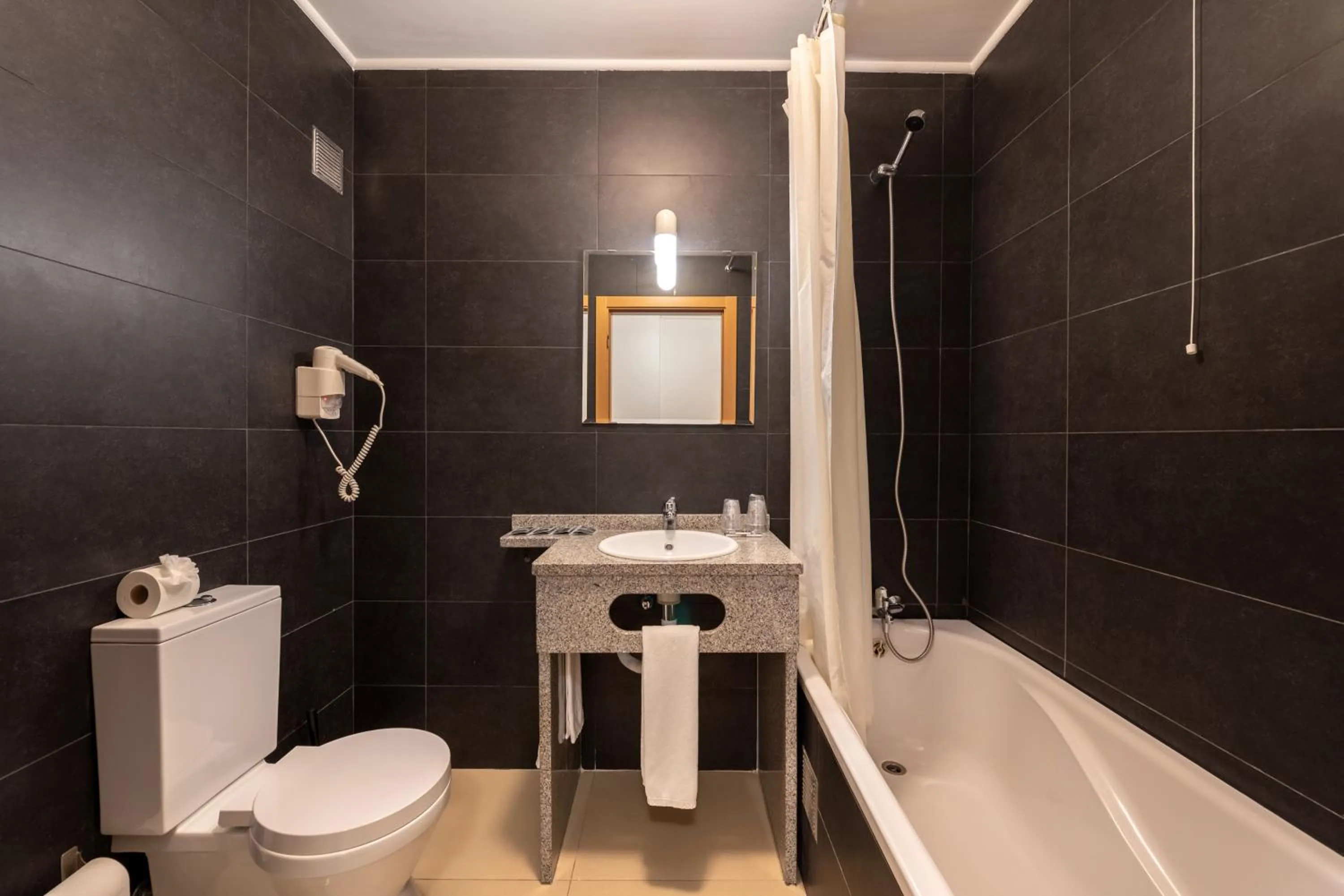 Bathroom in Apartamentos Mirante da Rocha