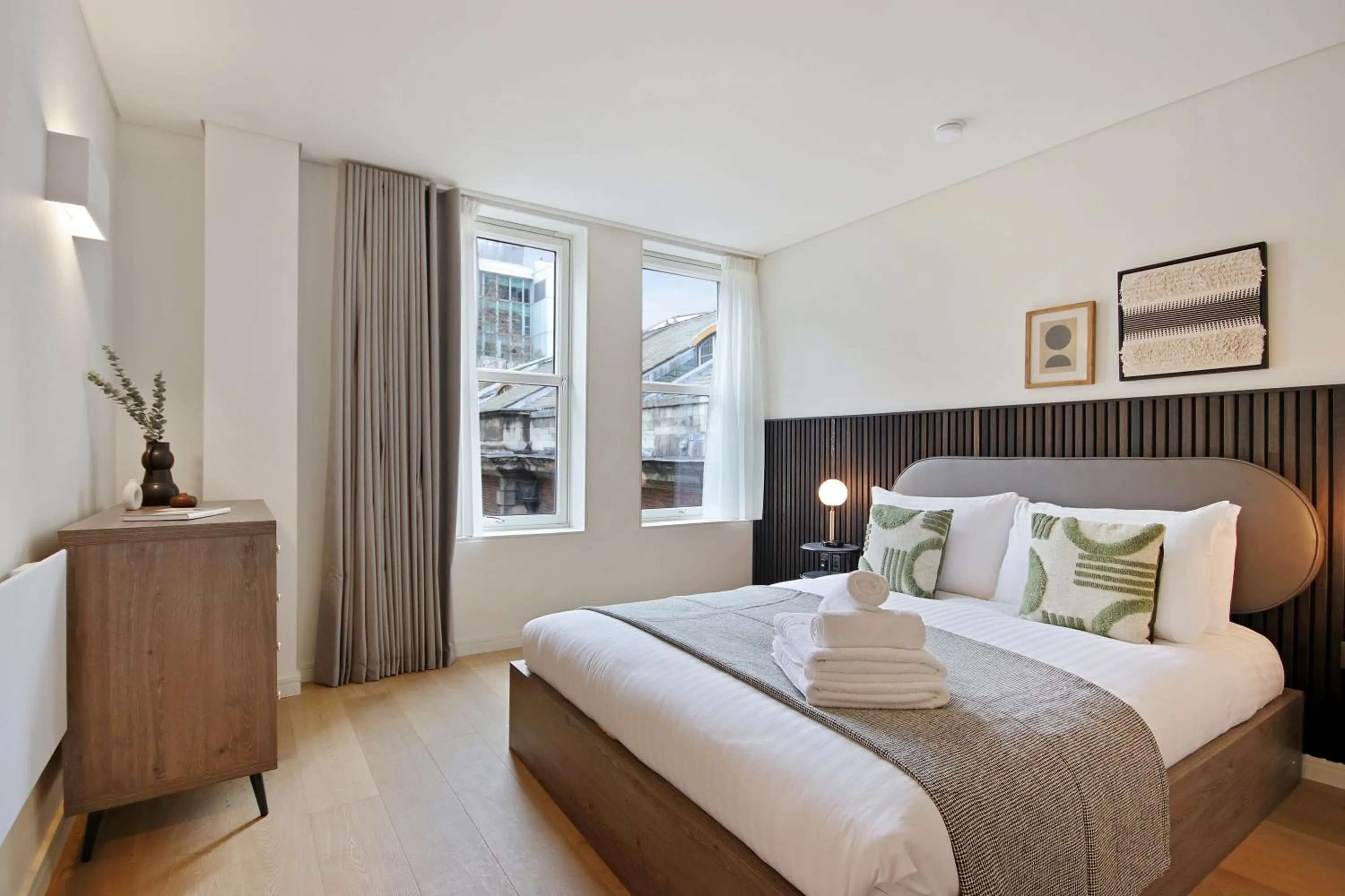 Bed in Bow Lane by Aeria Apartments