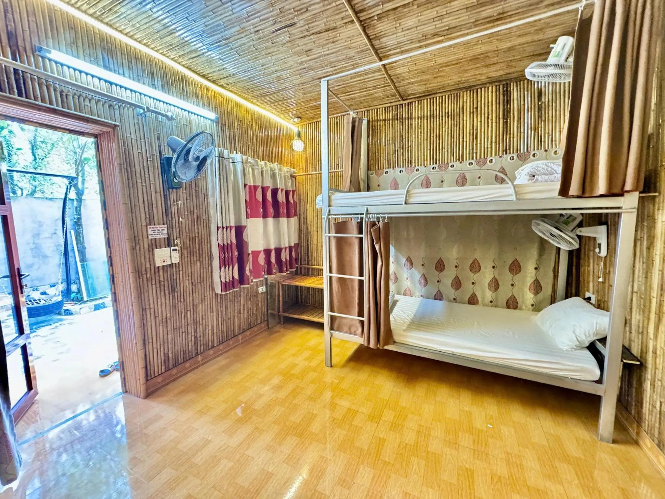 Living room, Bed in Tuan Ngoc Hotel