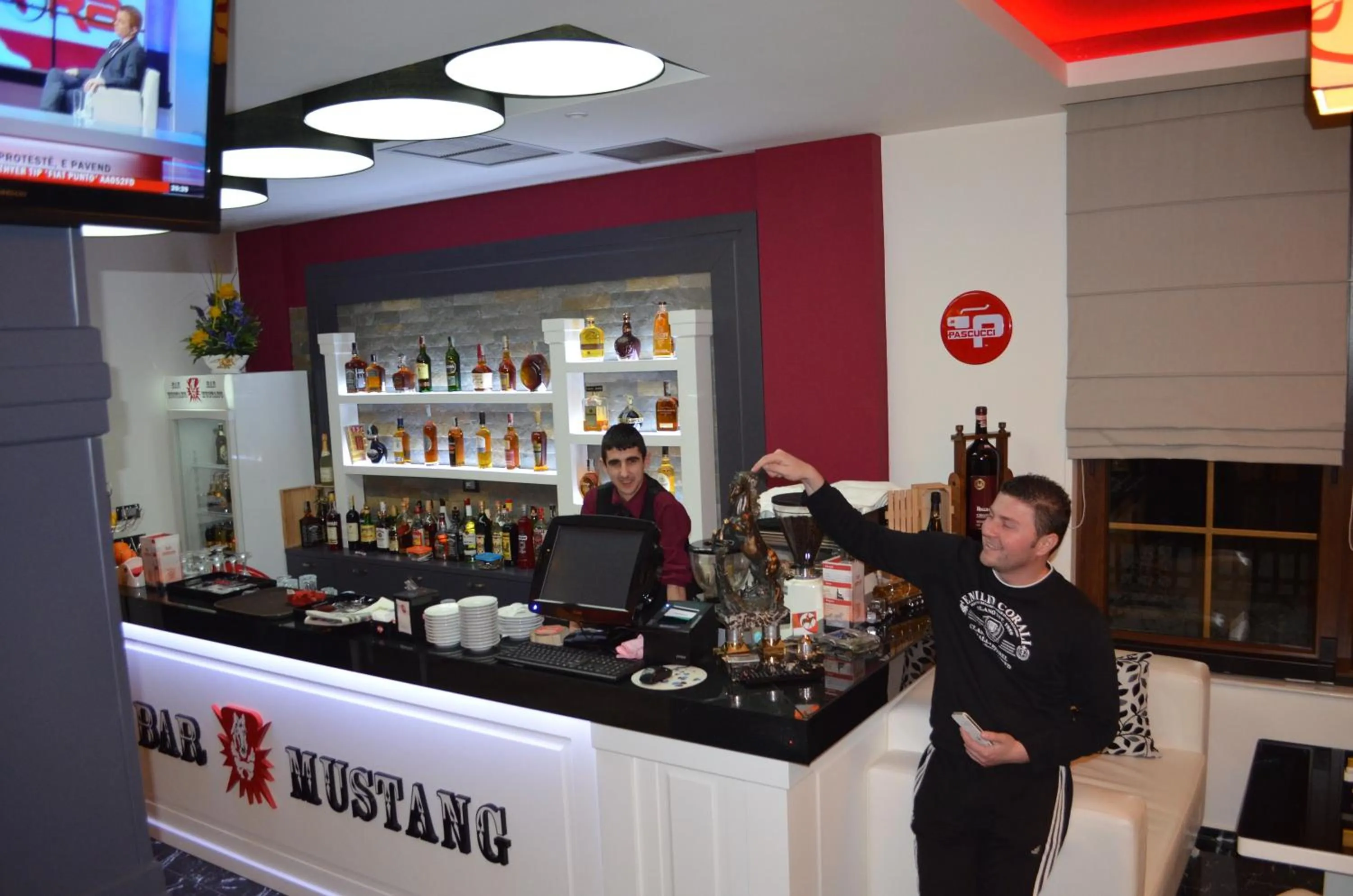 Property logo or sign in Hotel Mustang