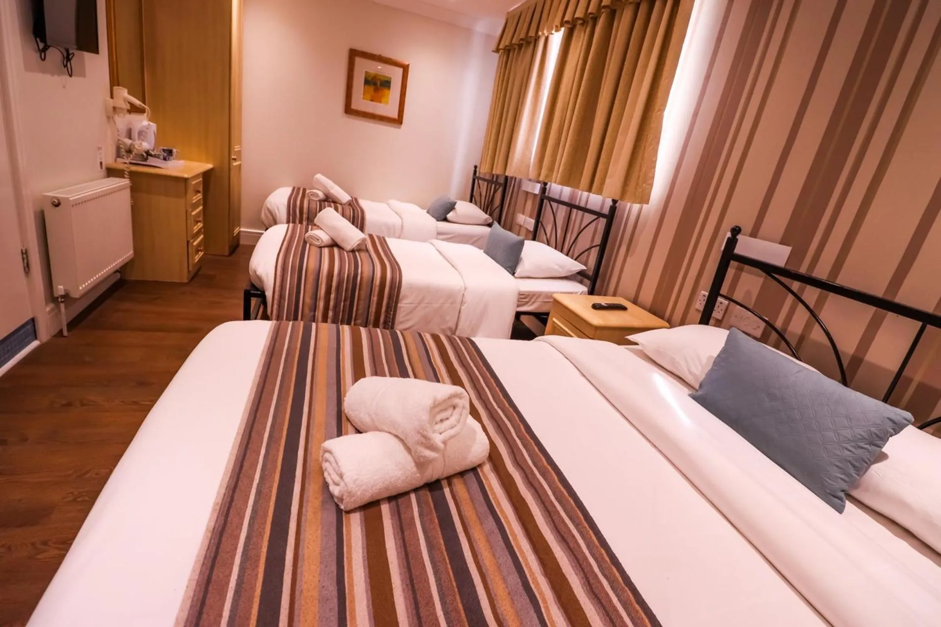 Bed in Fairway Hotel