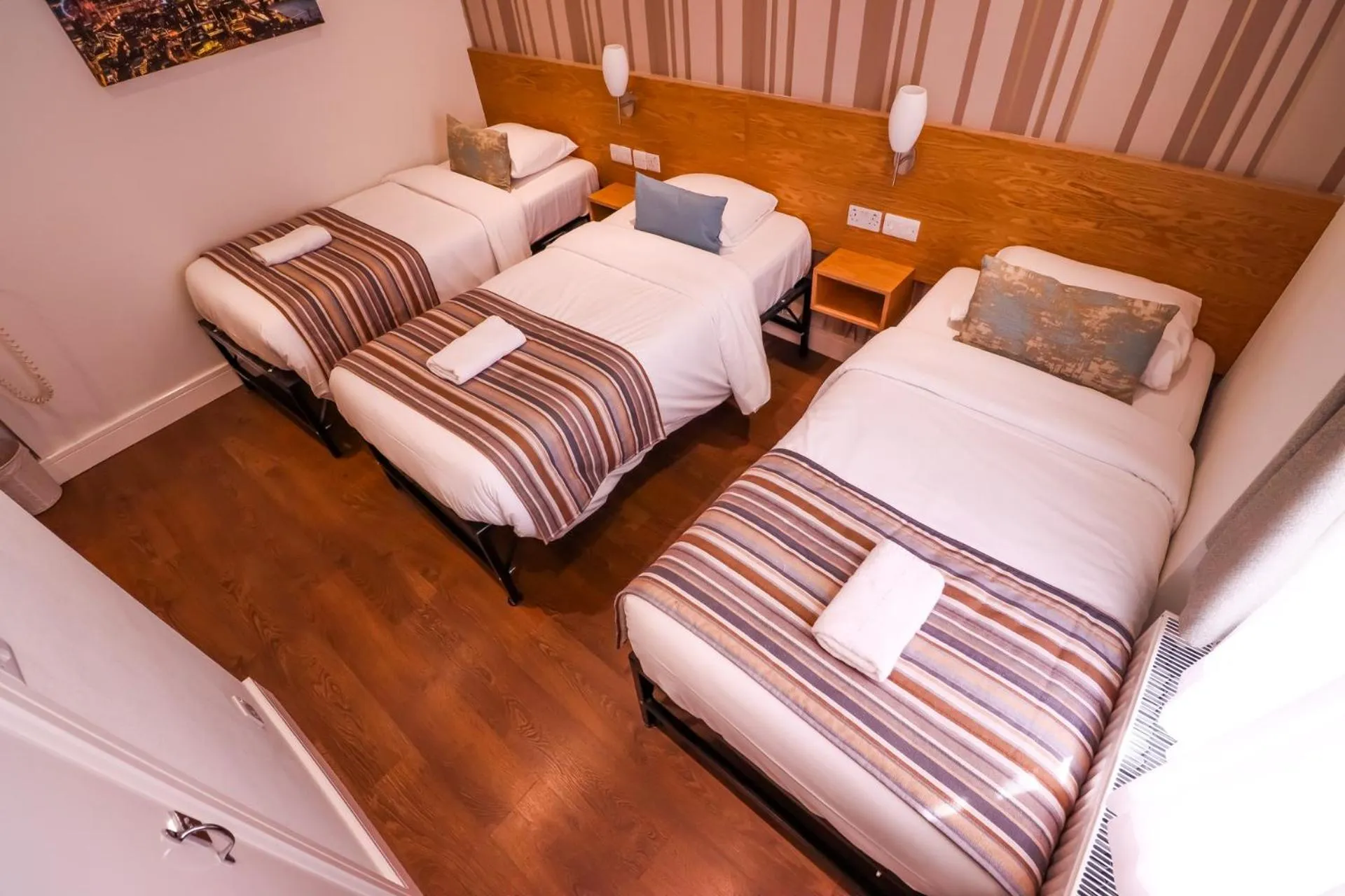 Bed in Fairway Hotel