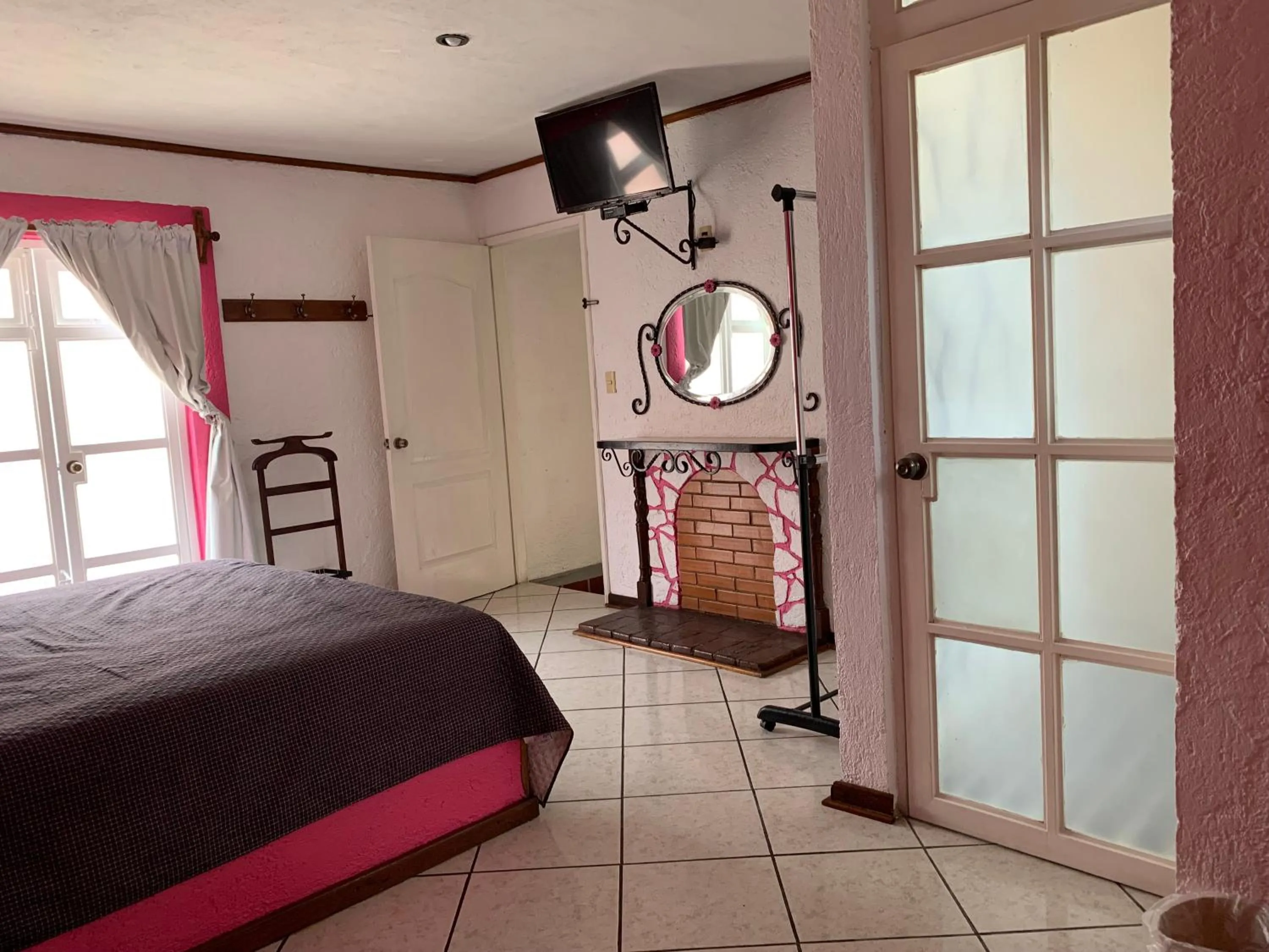 Photo of the whole room, Bed in Mesón Yollotl