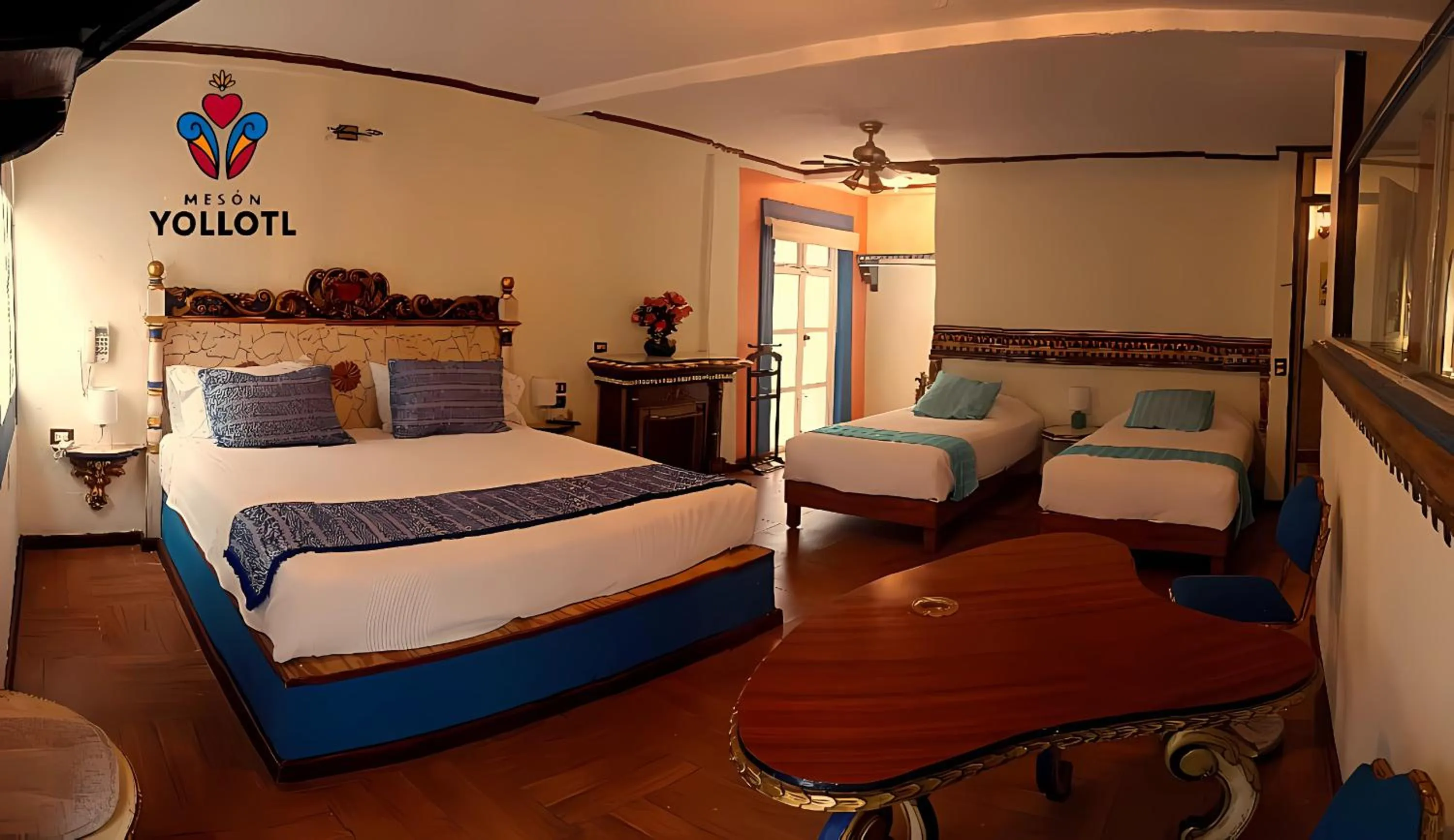 Seating area, Bed in Mesón Yollotl