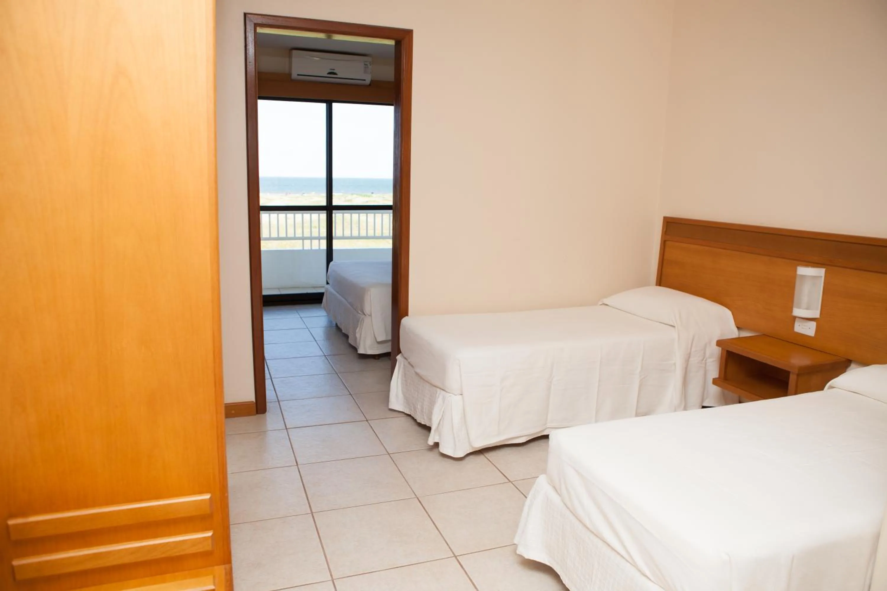 Balcony/Terrace, Bed in Nelson Praia Hotel